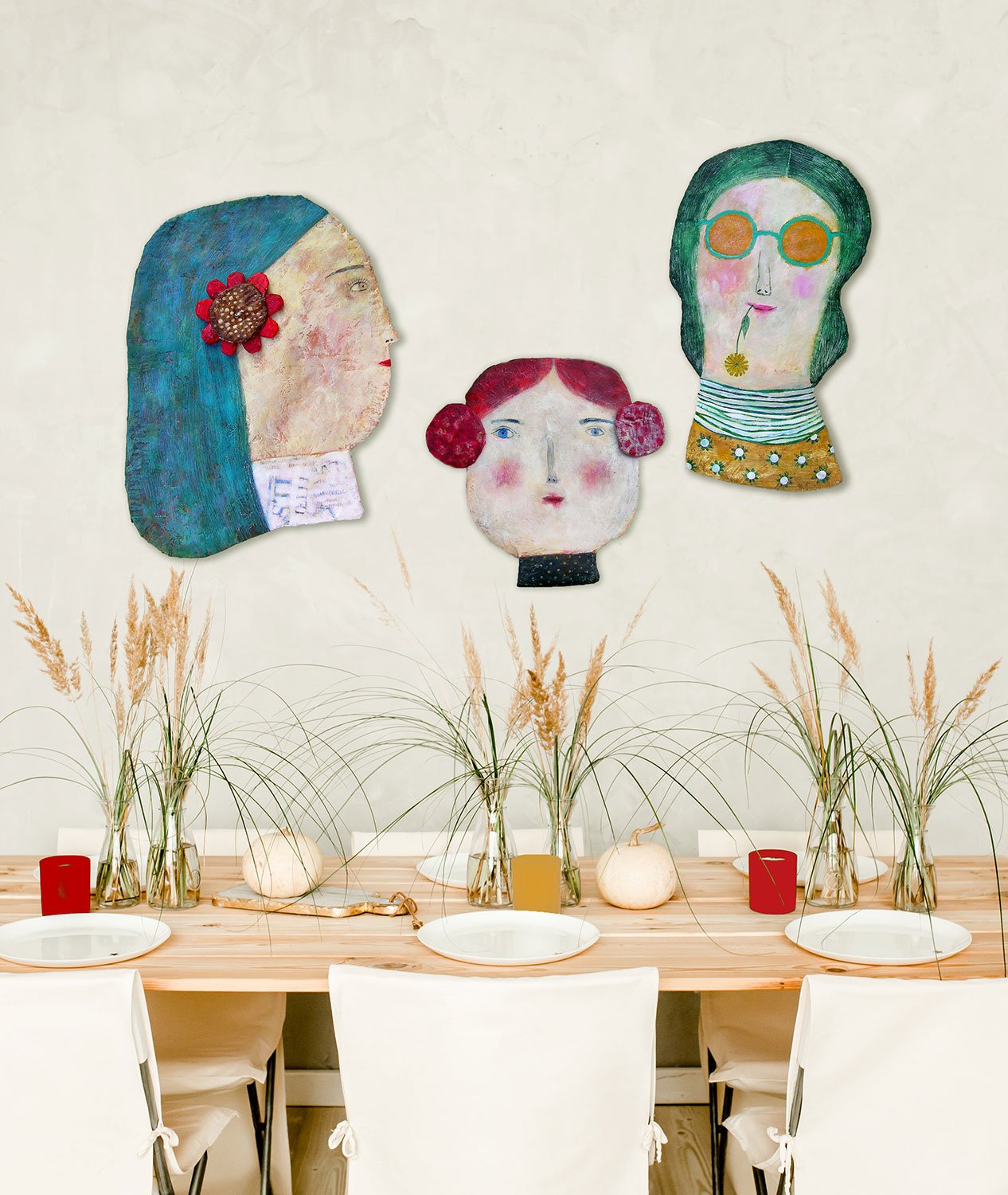 Three faces on a wall