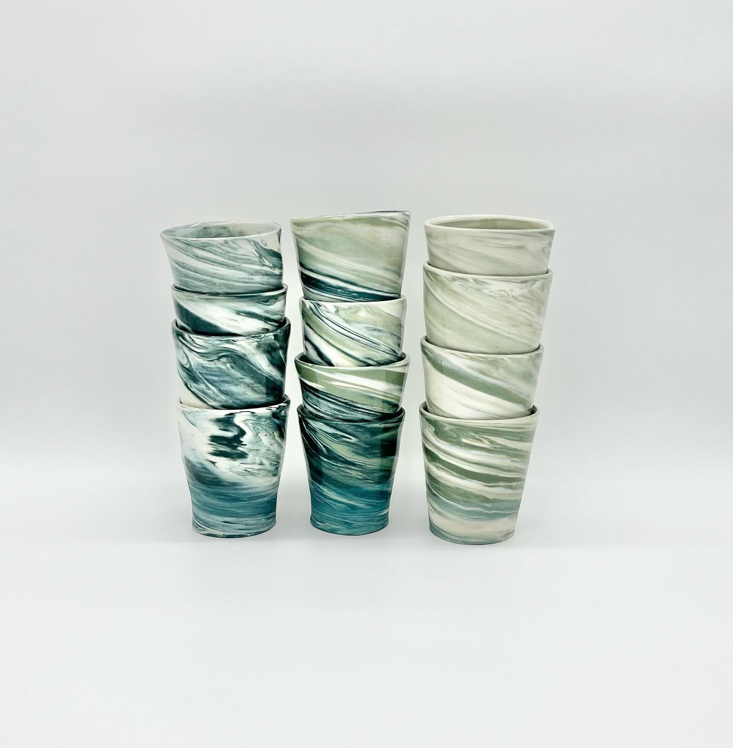 Adventures in ombr&eacute;.

Learning to stain porcelain made my mind explode with possibilities and opportunities.  Clay already has a lot of angles to explore so I tried to add just a couple new things at a time. 

There are a few dimensions that I