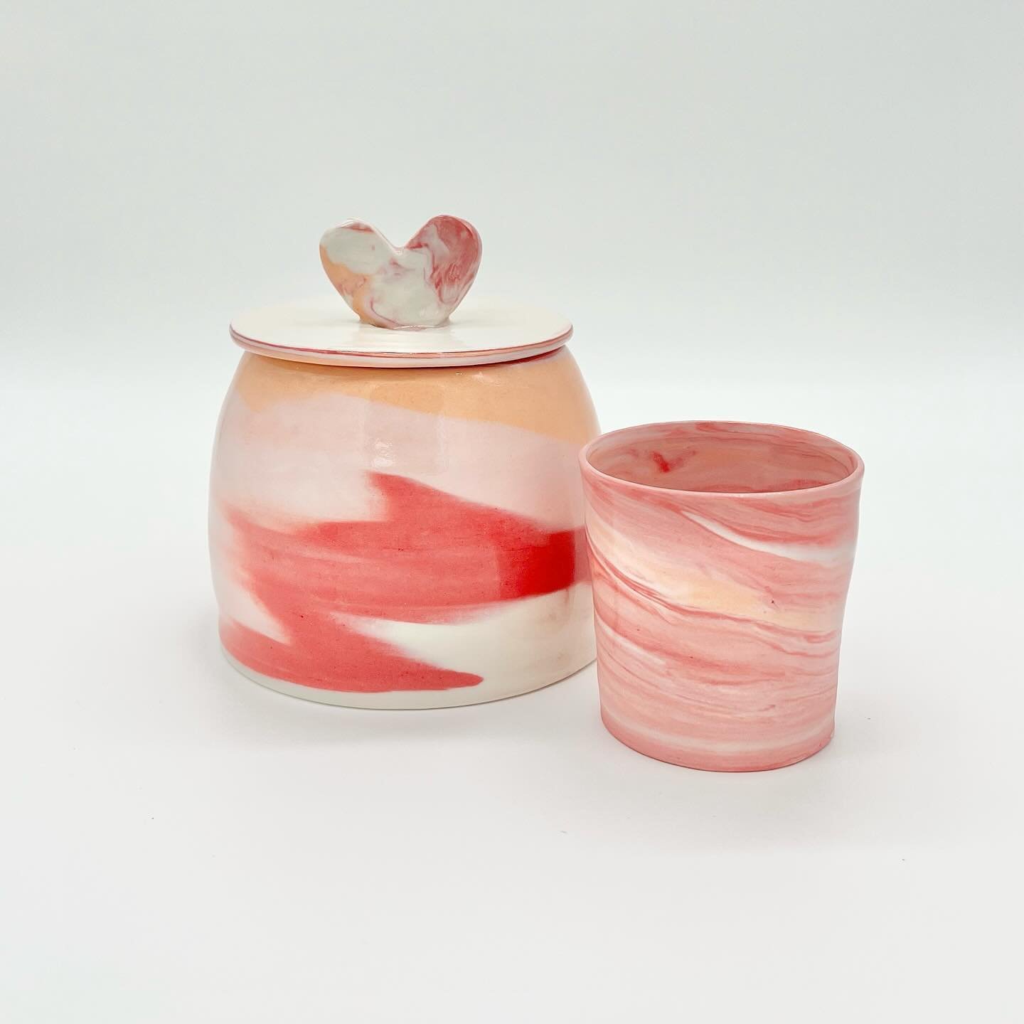 My little valentine.

Initially, my 8-year-old asked me for a tea set.  Seems fair to me that if your mom spends her days making pottery, then a request for a pink, red, and orange tea set is an immediate yes. 

I made all the pieces and was about to