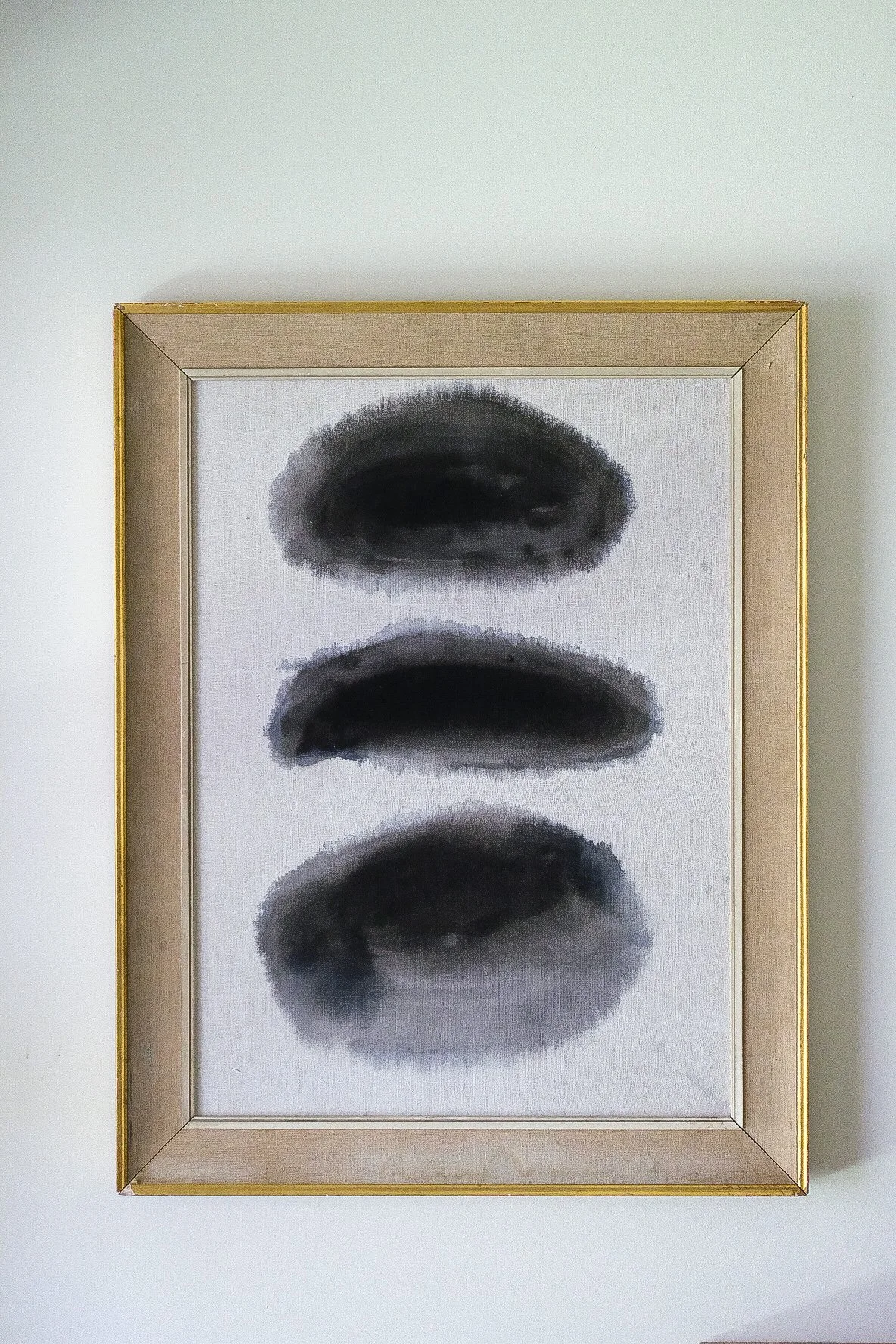 River Rocks, 2023 -- natural pigment on raw linen canvas in a vintage frame.