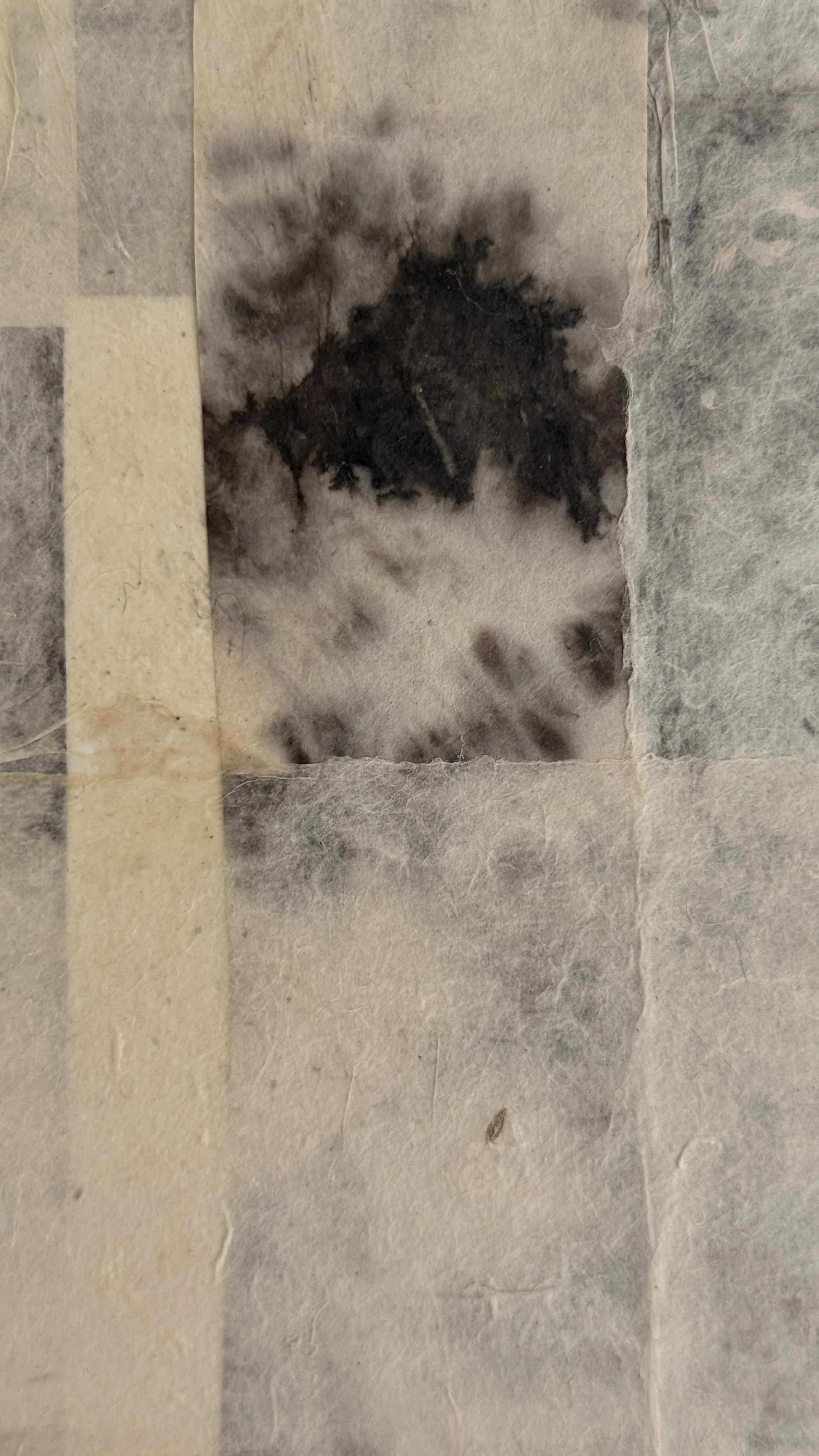 Small abstract collage of layered cream and grey handmade papers with a dark bloom-like mark near the top, unframed 6x6 art