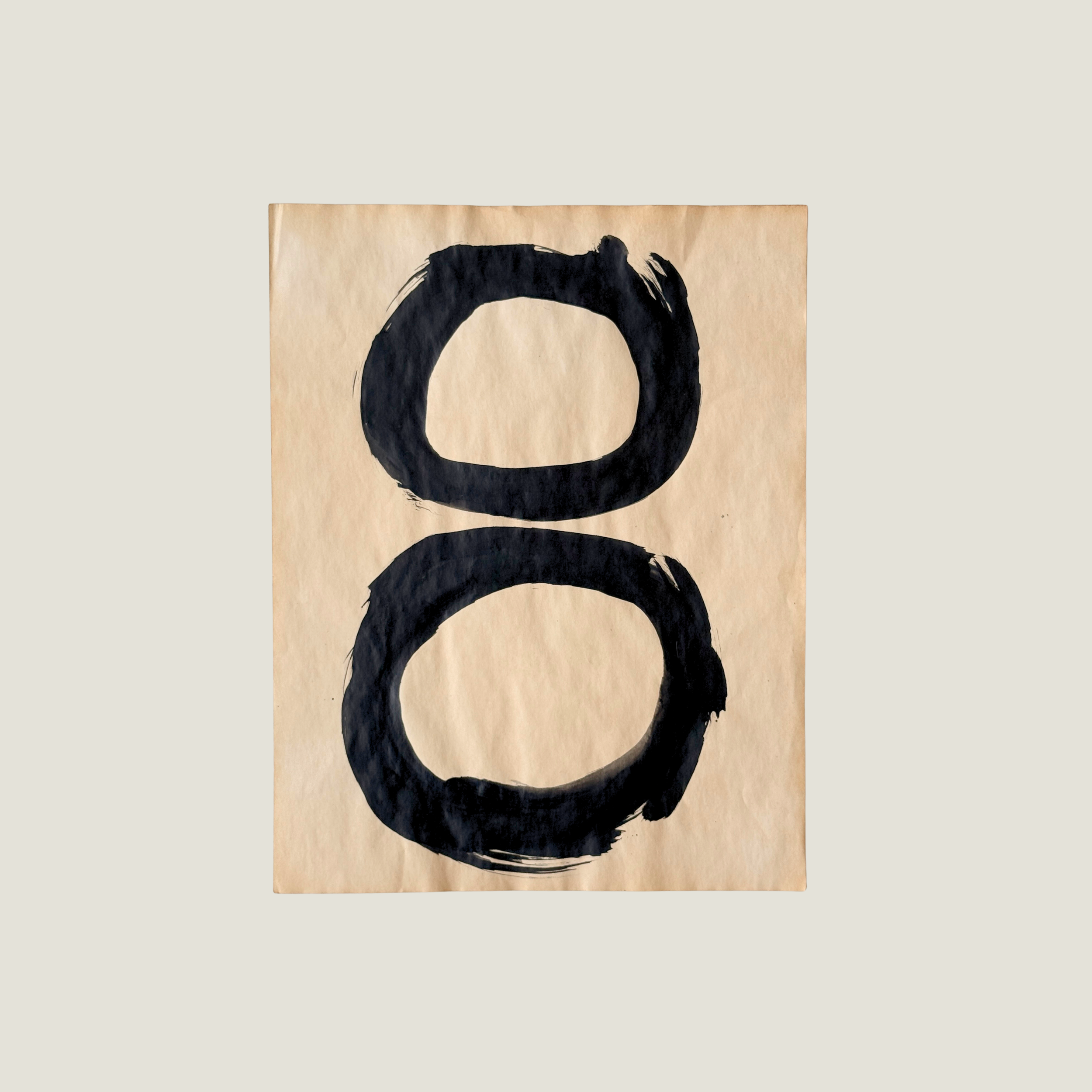 Original abstract ink artwork featuring hand-painted black circles stacked vertically on warm vintage paper.