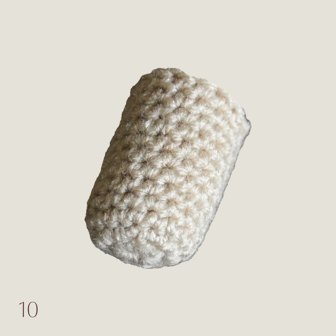 Oatmeal crochet chair socks used as floor protectors on furniture legs