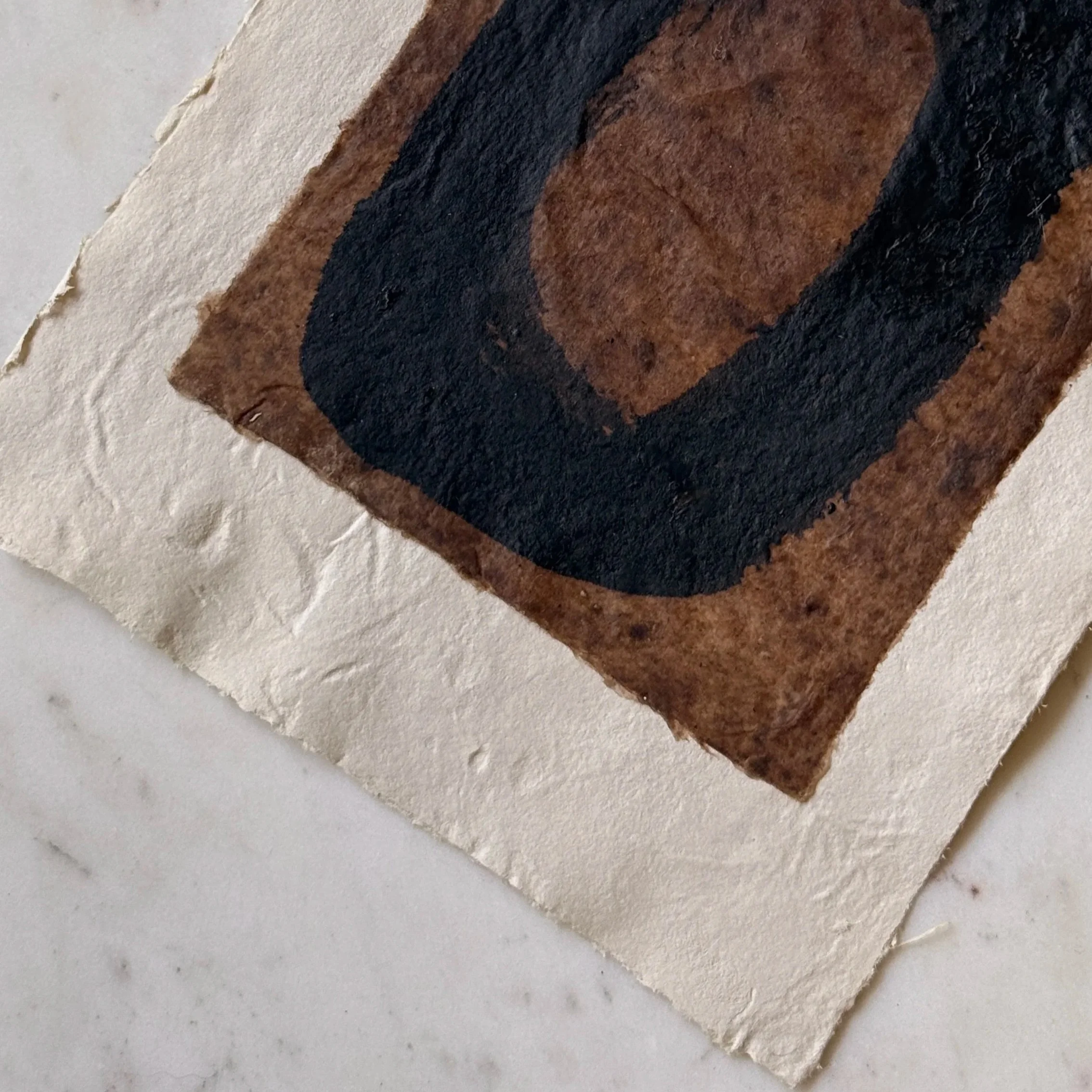 Original abstract paper collage featuring handmade paper, warm ochre fibers, layered neutral textures, and minimalist mixed media composition by Addison Ryan.