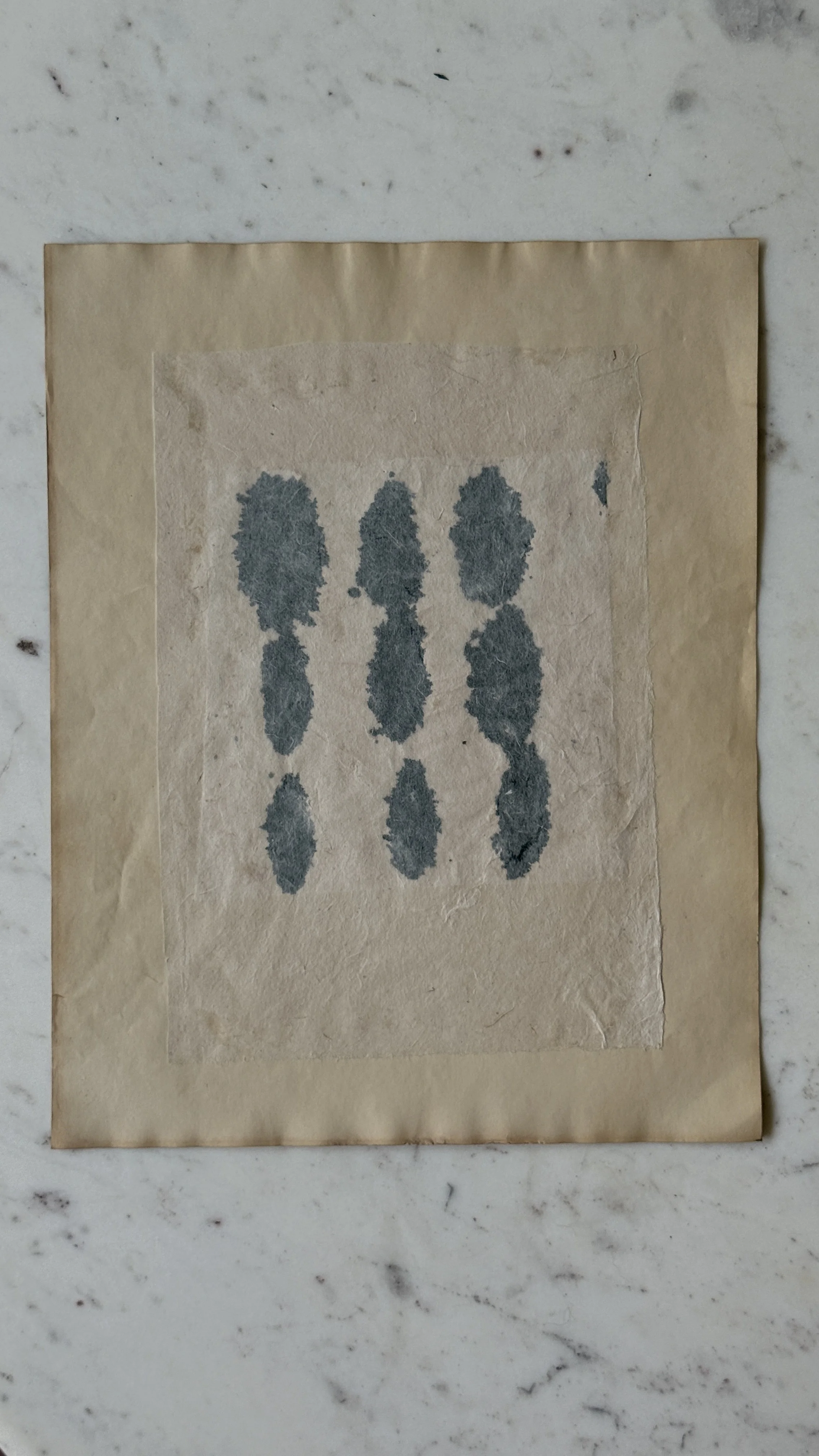 Original abstract paper collage featuring handmade paper, warm ochre fibers, layered neutral textures, and minimalist mixed media composition by Addison Ryan.