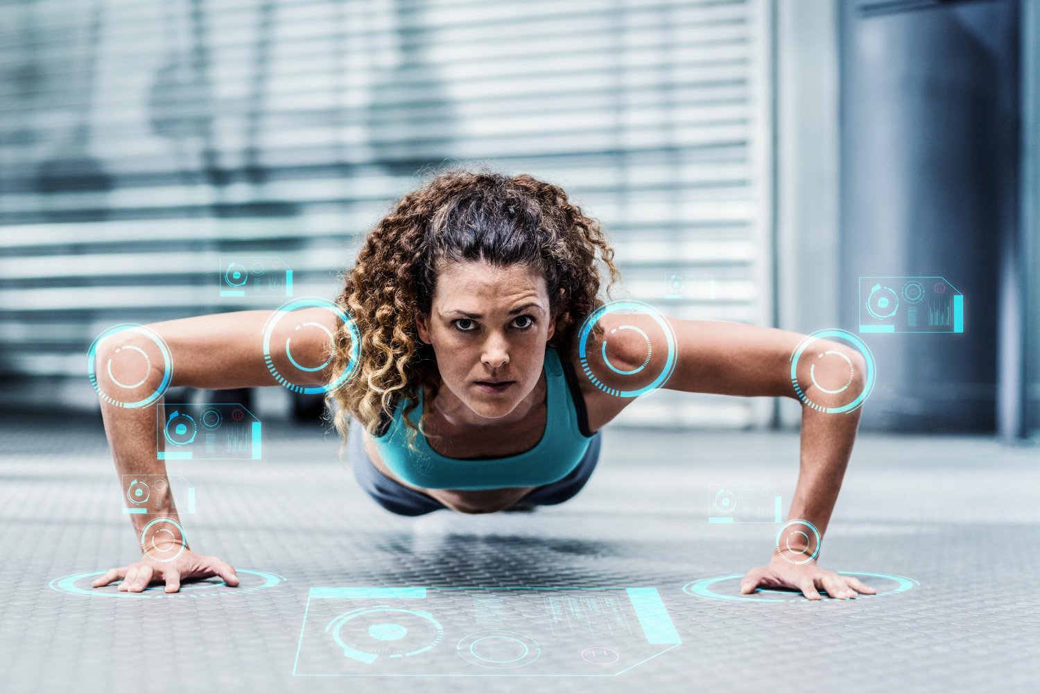 woman doing pushups working to fitness goals with app from Movement 1st Wellness
