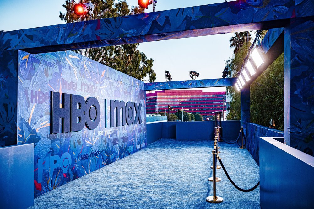 HBO Max event entrance with blue decor and branding