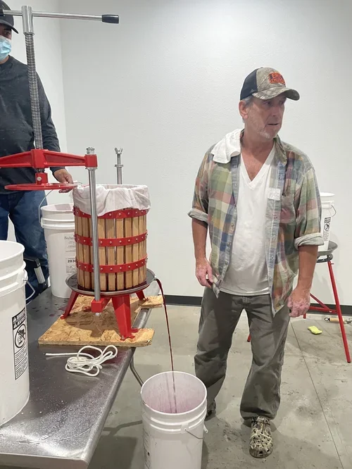 The craft of winemaking at Baxter Ranch, where seasonal grape harvests are carefully processed using traditional methods to create handcrafted mountain wine.