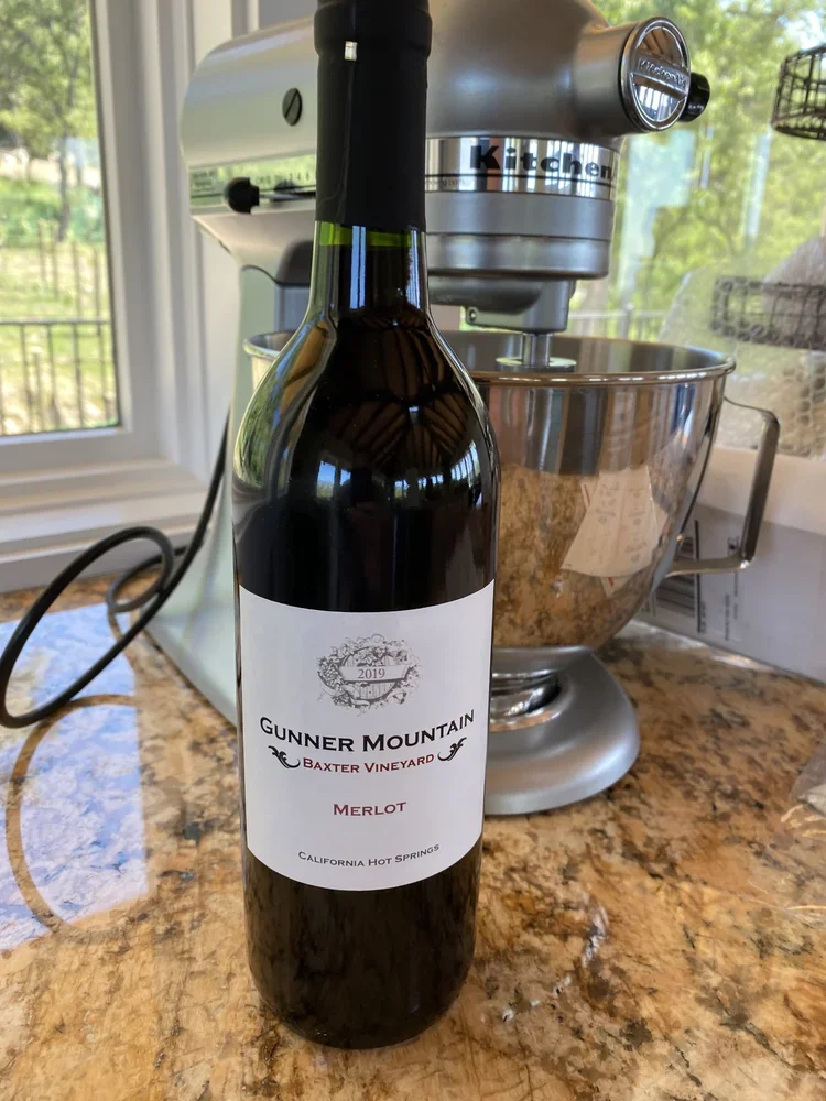 Gunner Mountain Merlot from Baxter Ranch, a California Hot Springs wine created from locally harvested grapes and part of the ranch’s vineyard and farm-to-table traditions.