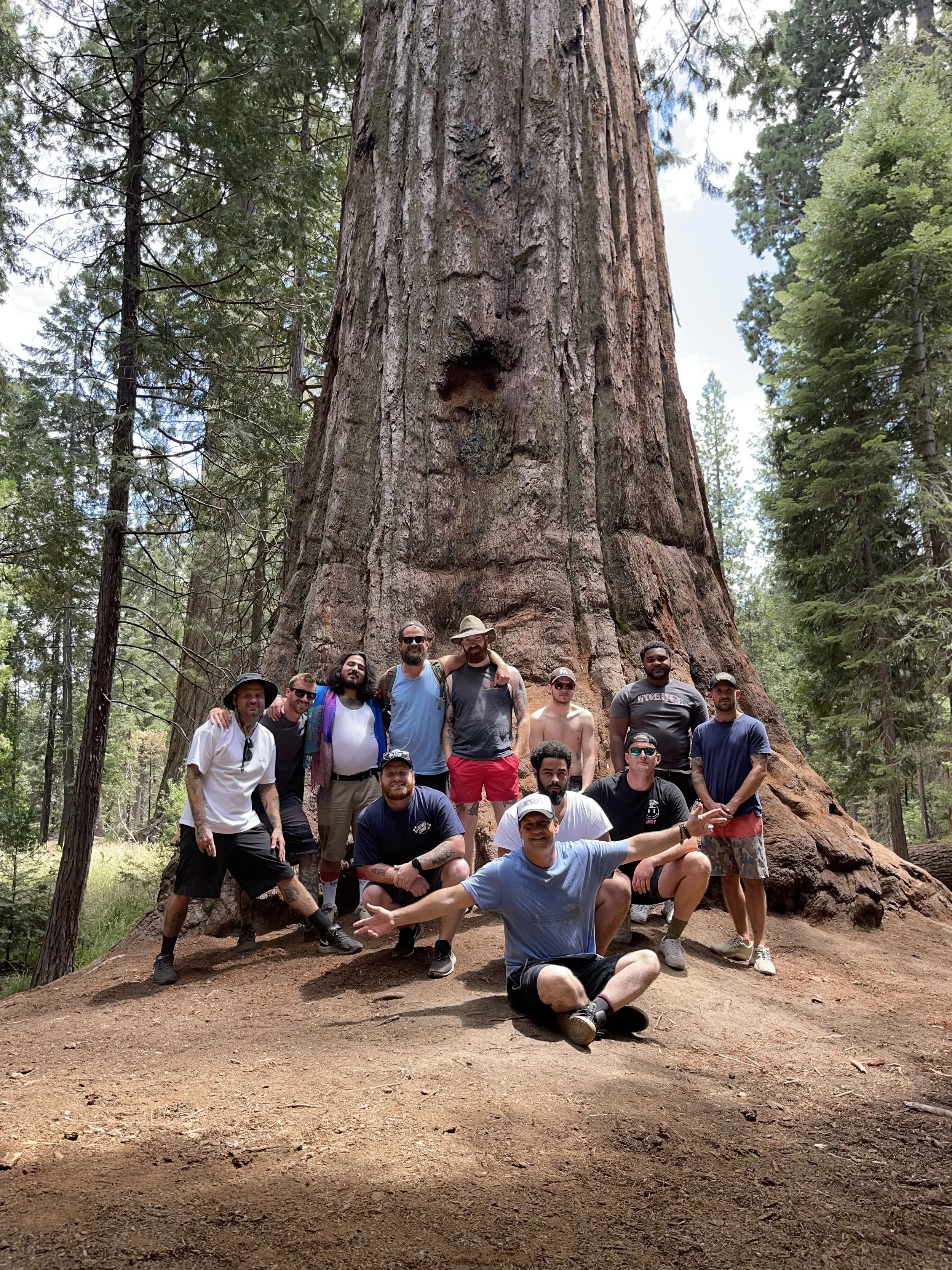 Group exploring the giant sequoia forests near Baxter Ranch, sharing a memorable outdoor experience among towering trees and the natural beauty of California’s Sierra Nevada mountains.