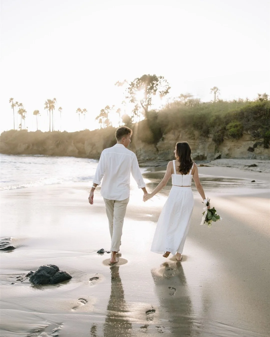 Engagement ft the prettiest light &mdash;

#newportbeachphotographer #lagunabeachphotographer #beachengagementsession #ocweddingphotographer #proposalphorographer