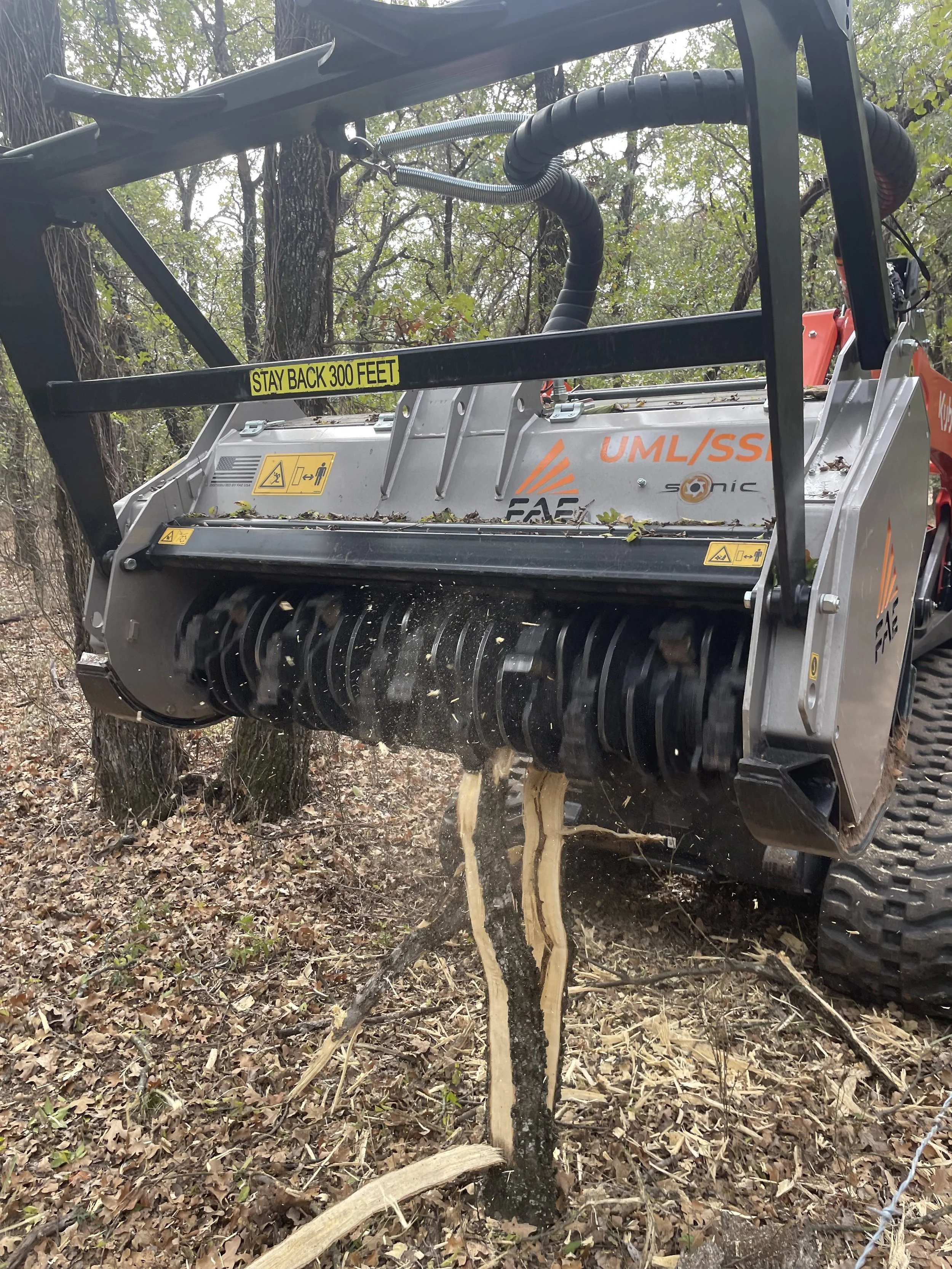 Tree Shredding in Copeville, TX by Forestry Mulching Machine.