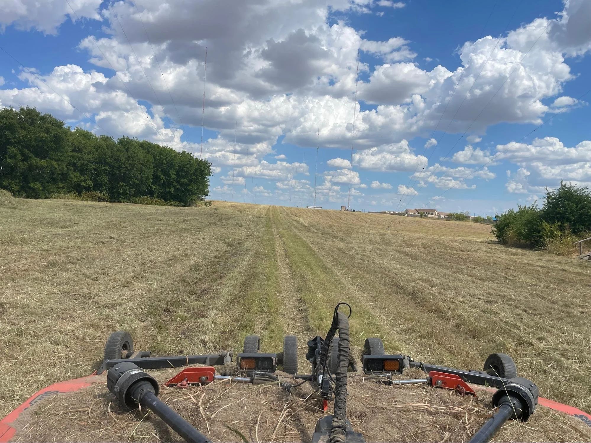 Tractor Mowing a Lancaster, TX Field.
