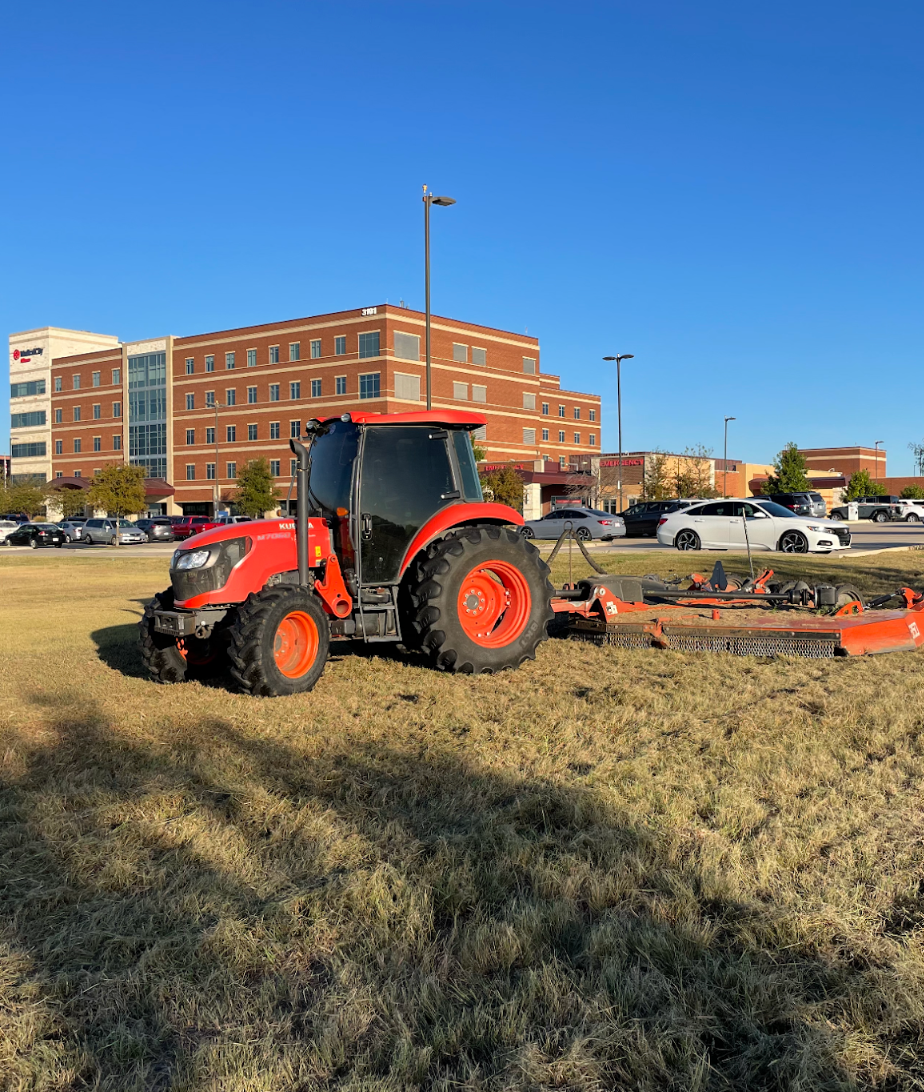 Tractor mowing for commercial clients of Bedford, Texas.