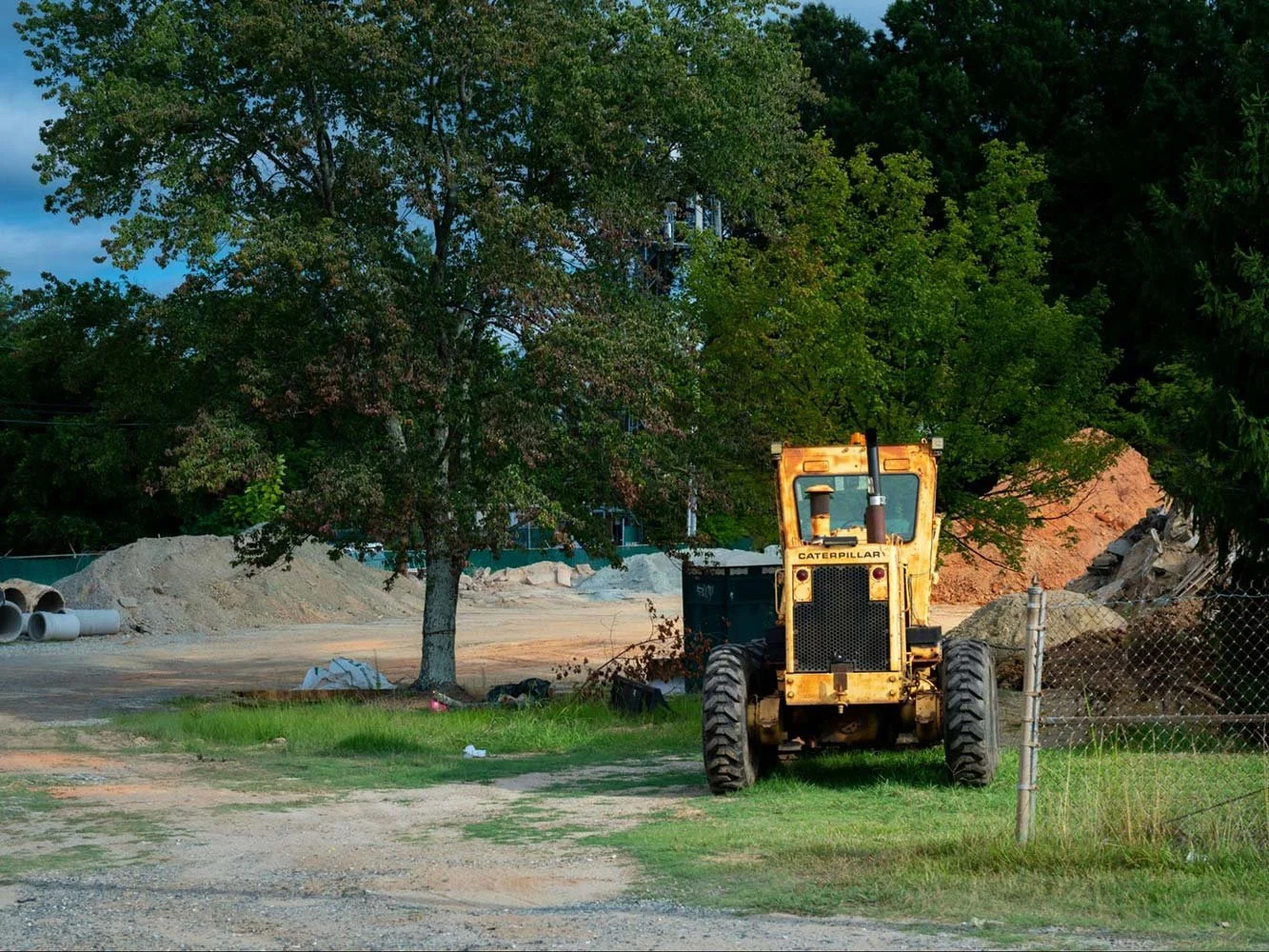 Heavy machinery parked on a cleared construction site