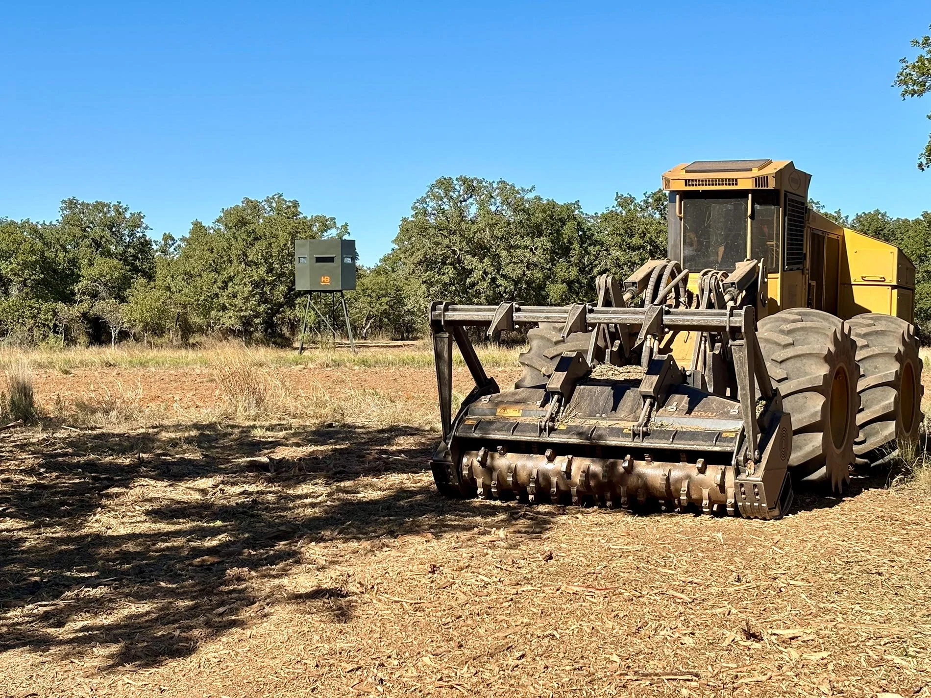 Land-clearing equipment on rural hunting property