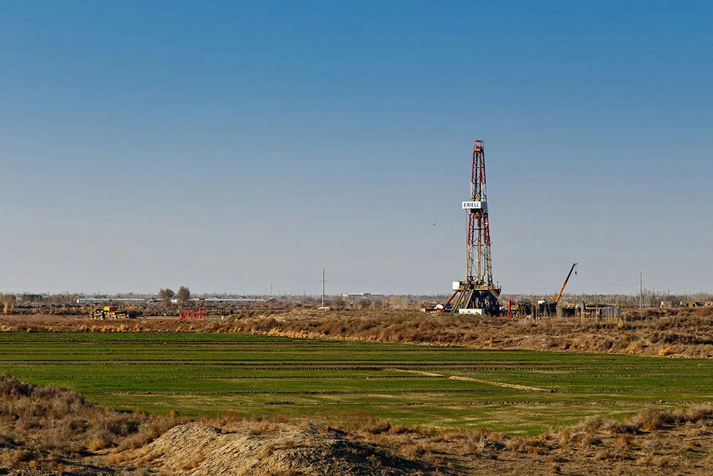 Large oil rig site on an open field