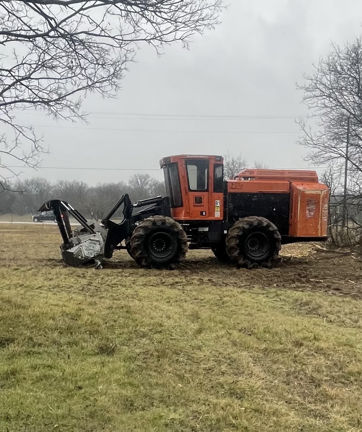 Heavy Duty Breckenridge, TX Land Clearing machine on overcast day at Commercial Property.