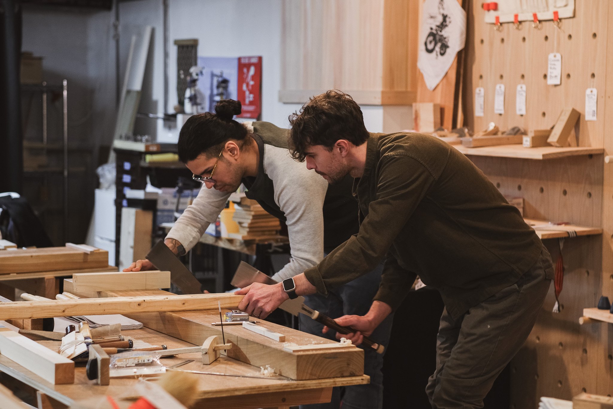 This image shows an in-person class for Japanese woodworking in NYC