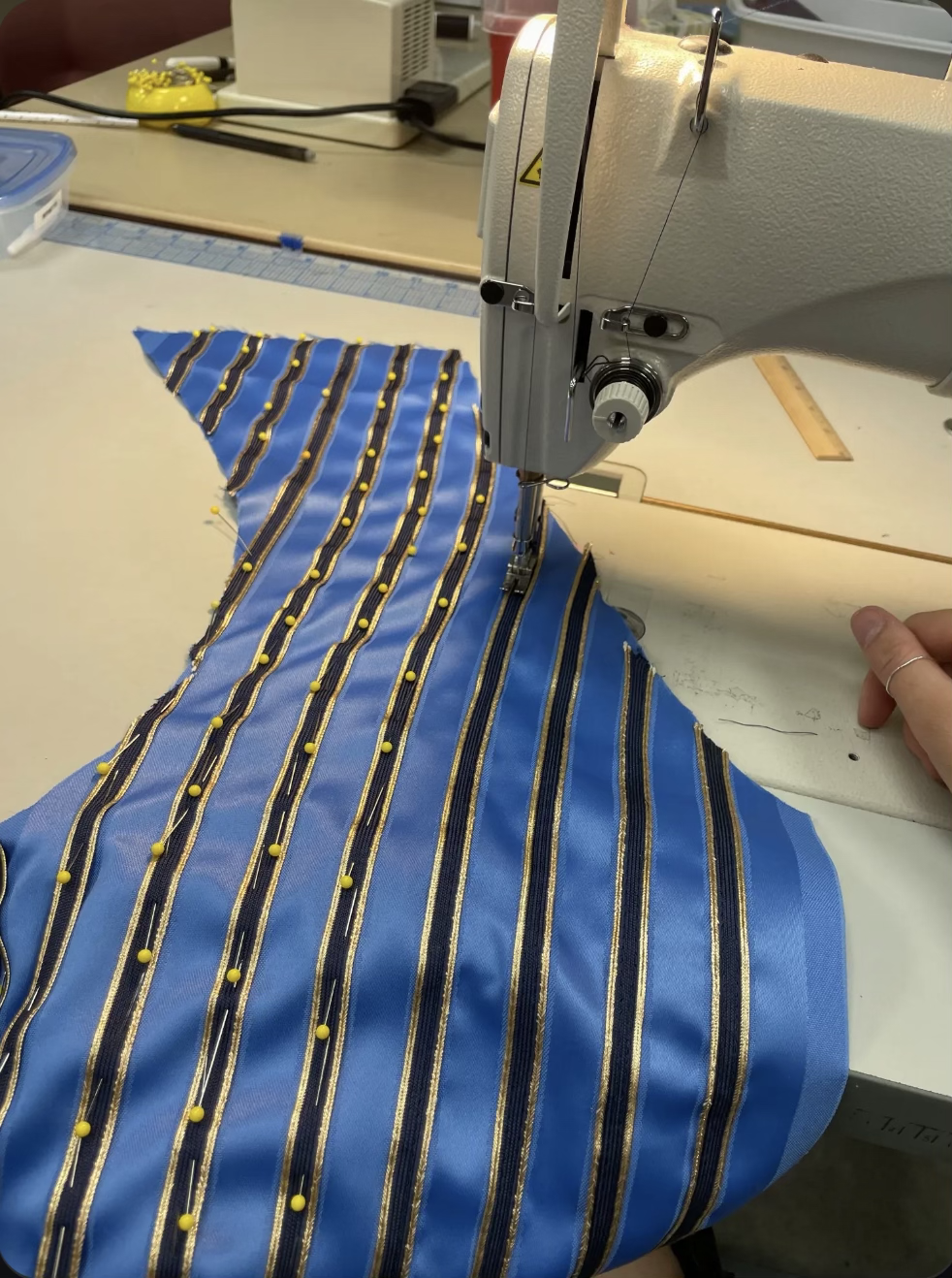 Beauty and the Beast at MTW - Construction of the Beast's ball vest, including the addition of gold and navy striped trim to the fabric.