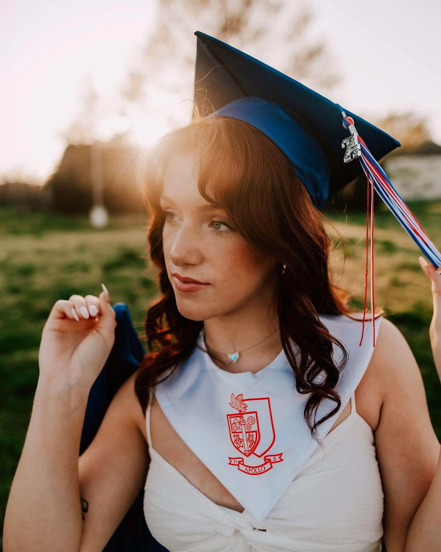 This year, I have introduced a new senior portrait experience that includes a cap and gown session. I have to say, I am loving it! The senior portrait experience consists of three sessions that capture the entire senior journey, which has worked perf