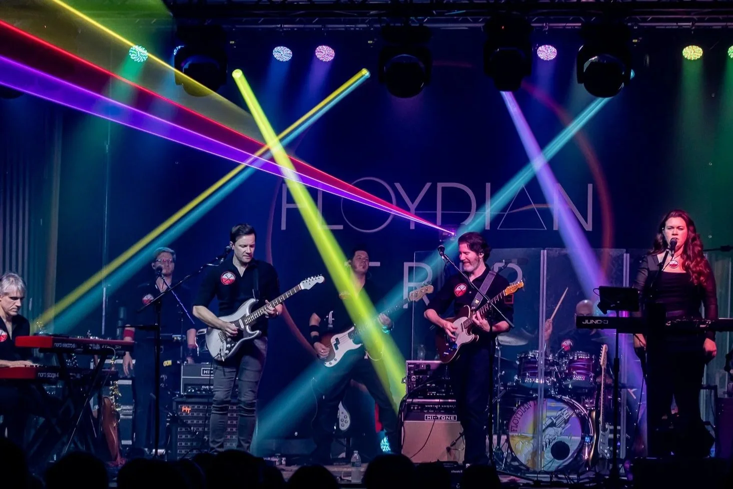 Floydian Trip on stage under a laser light show