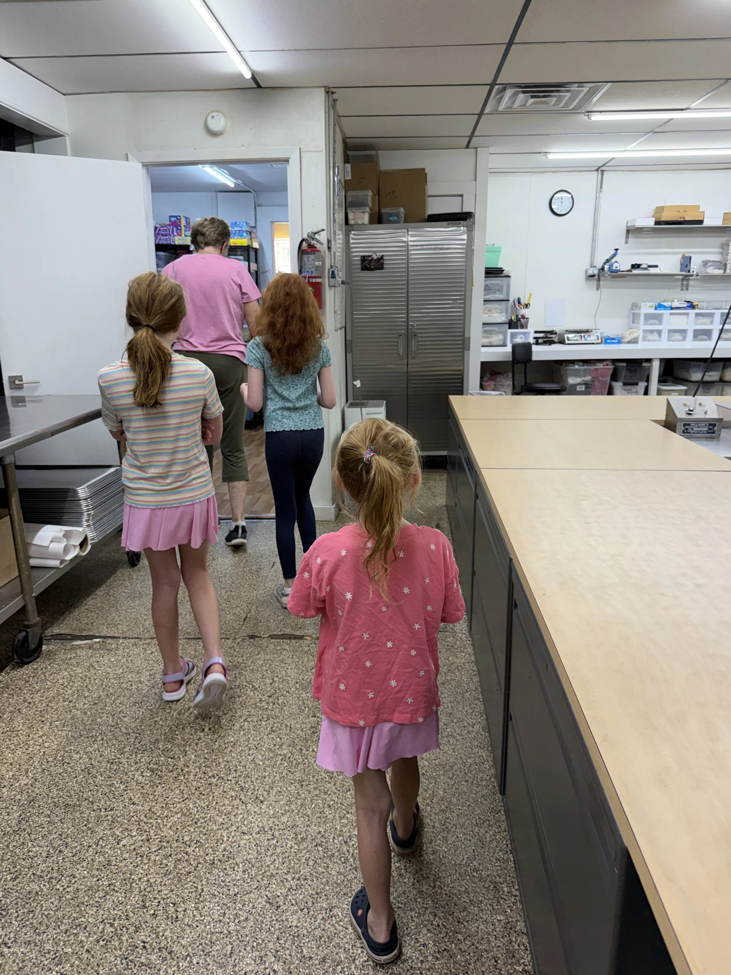 walking through the chocolate room at lindale candy co.JPG