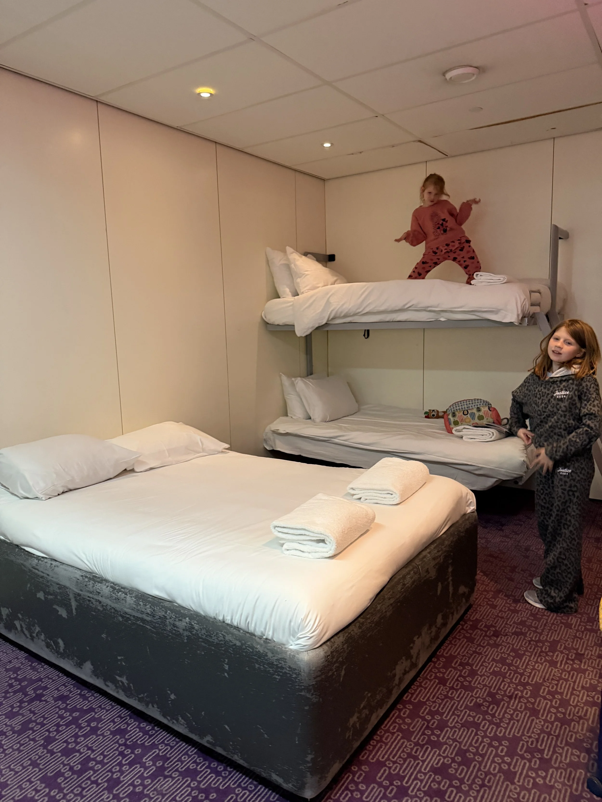 View of the beds in the family room at YOTELAIR Amsterdam Schiphol