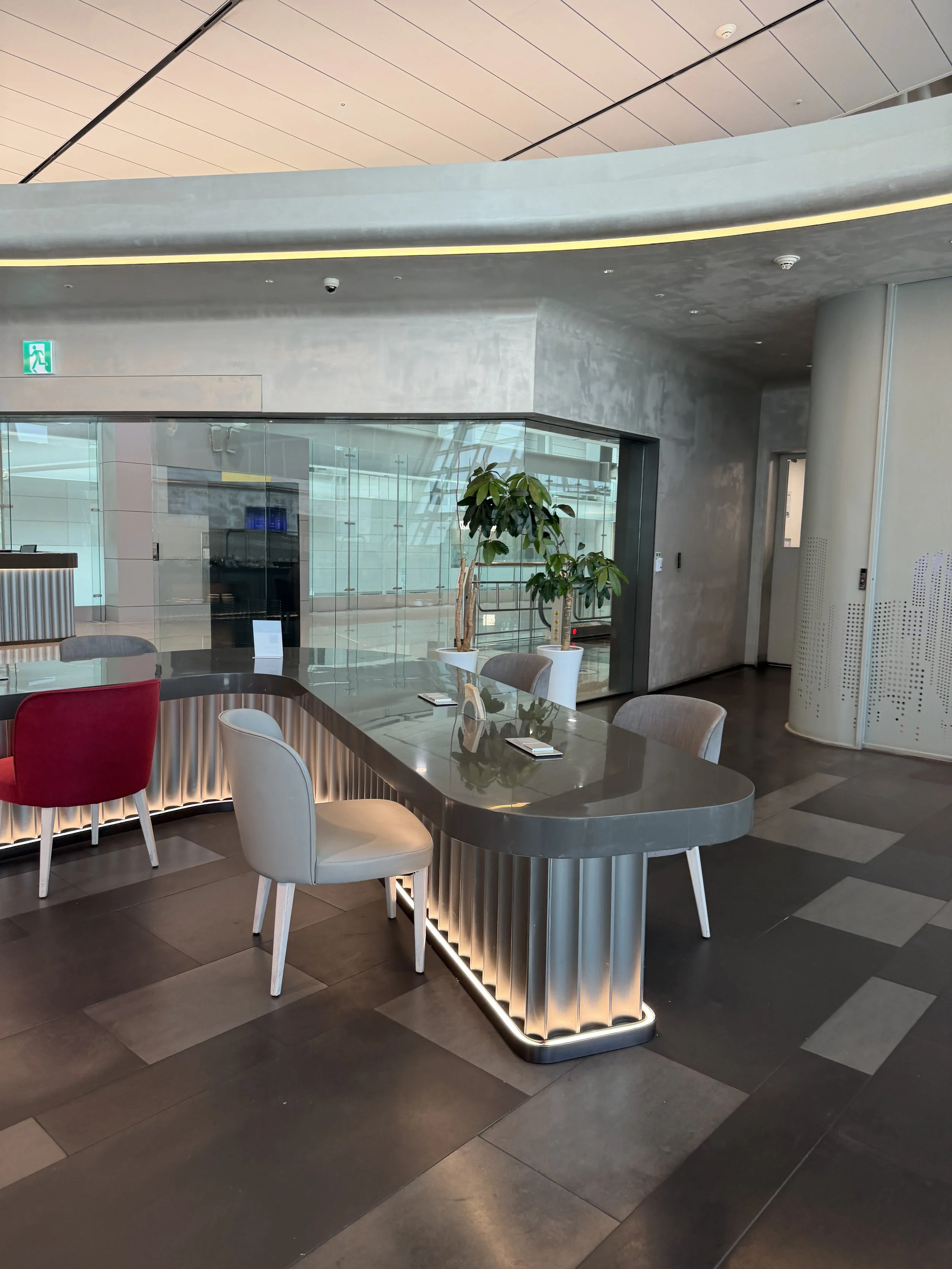KAL lounge terminal 1 table with seats.JPG