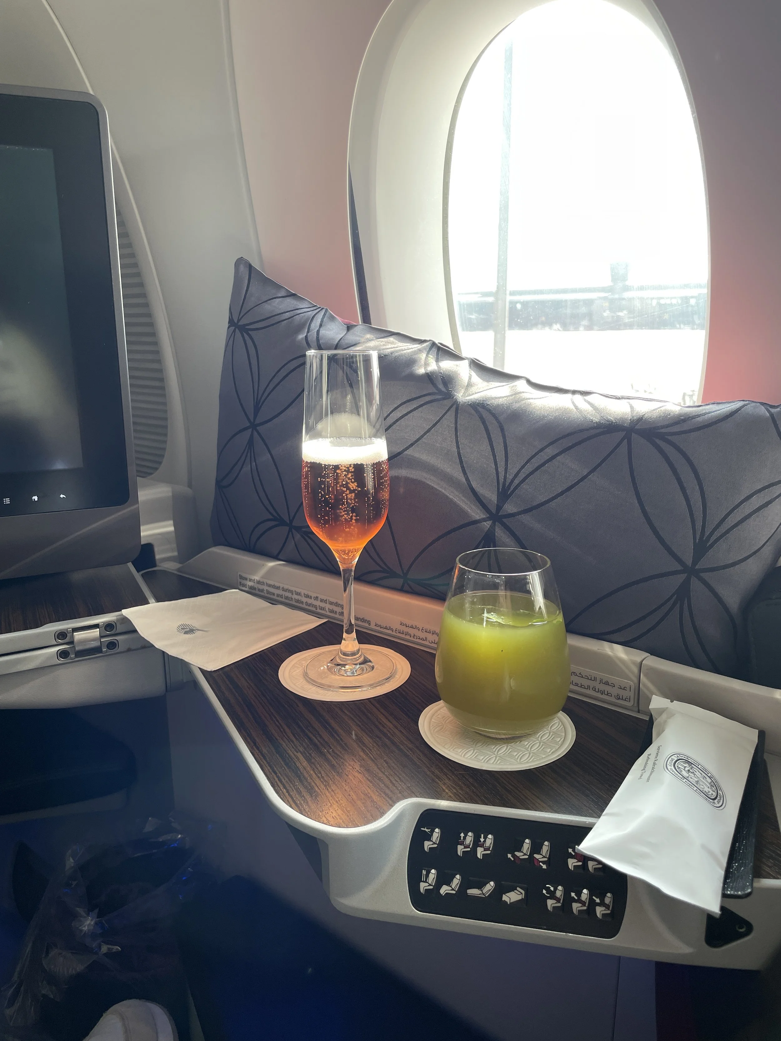 Qatar Airways business class beverages on A350 flight from Doha to Rome