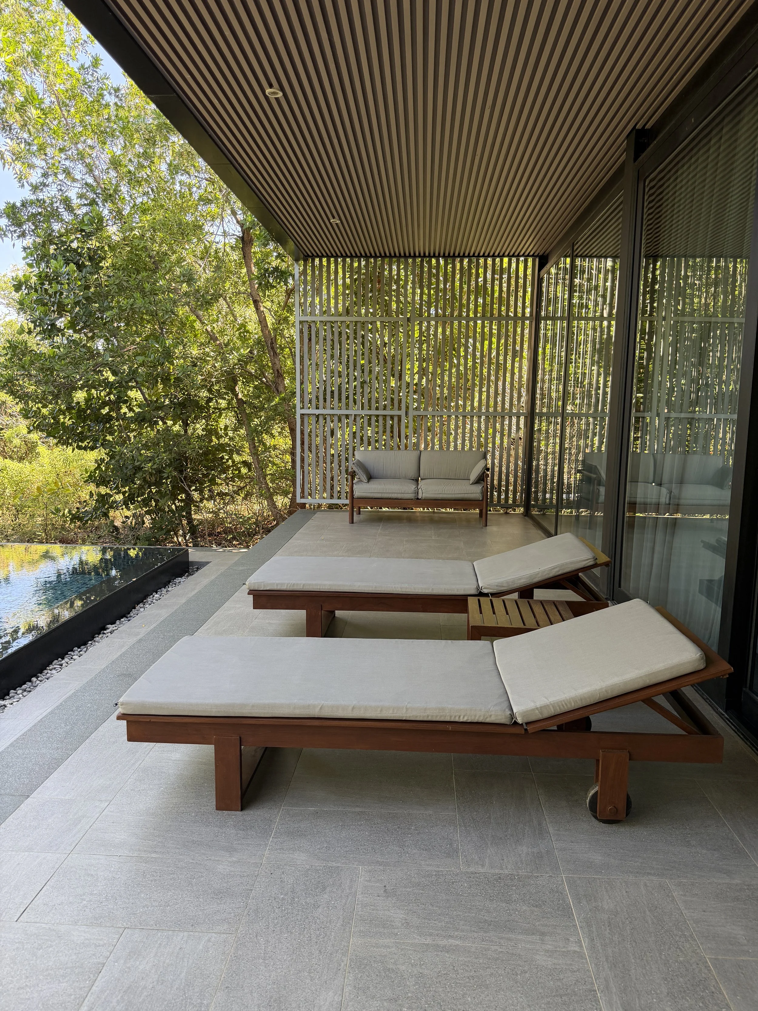 hilton yala room chaise lounge and pool.JPG