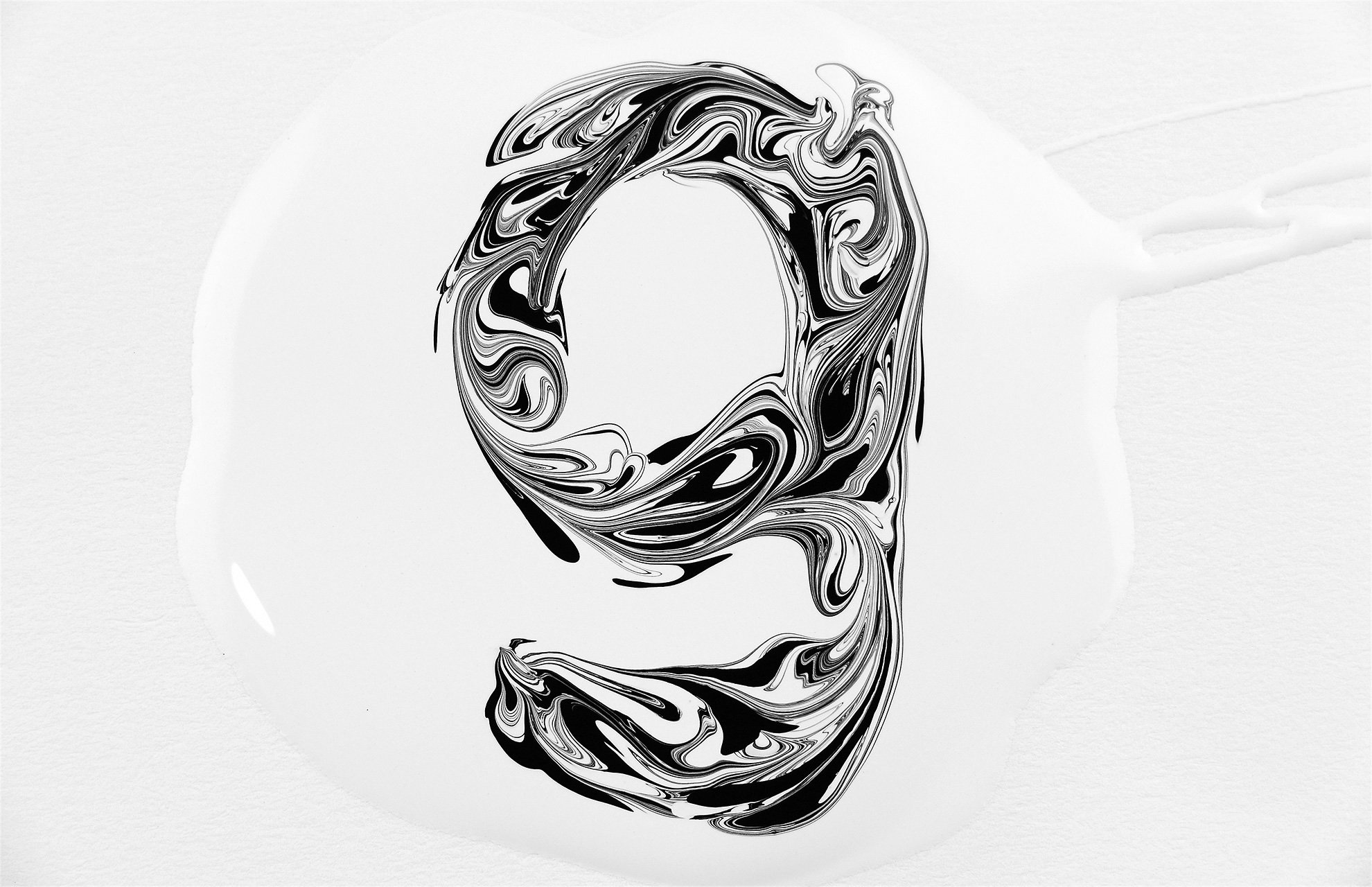 A special technique of swirling paint was used to create the 'g' icon.