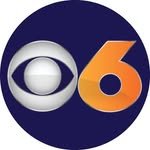 CBS 6 logo with a white sphere and orange number 6 on a dark blue background