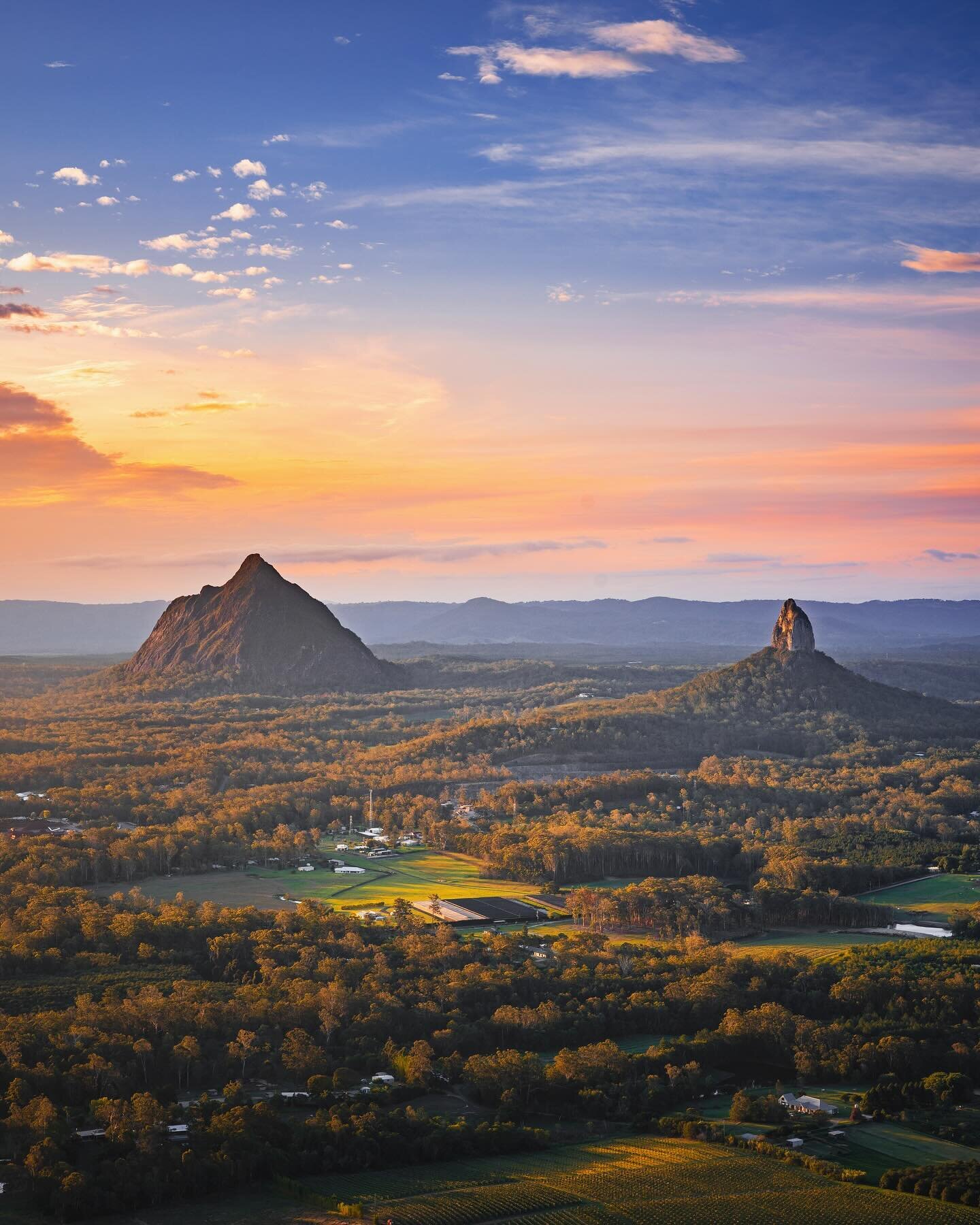 A colourful sunset from the Glass House Mountains. I absolutely love this angle where the mountains and farmland catch the shadows on the side, amplifying the vivid colours! From left to right in this photograph, you can spot Tibberoowuccum, Beerwah,