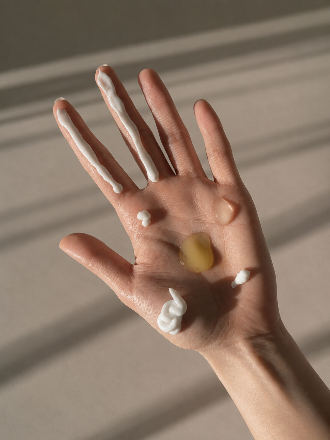 Skincare textures in soft sunlight.png