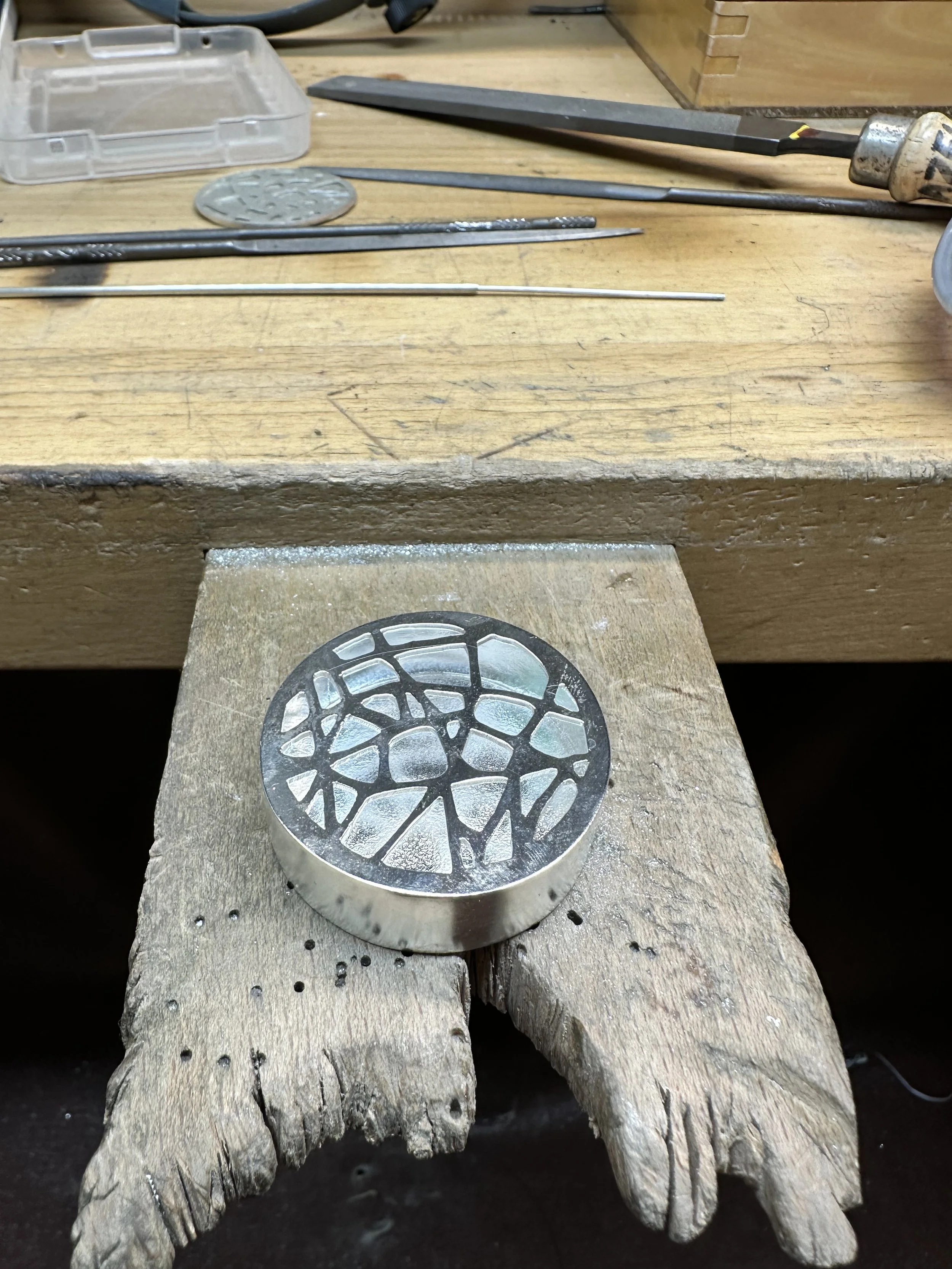 A shadowbox pendant, the depth adds internal shadows