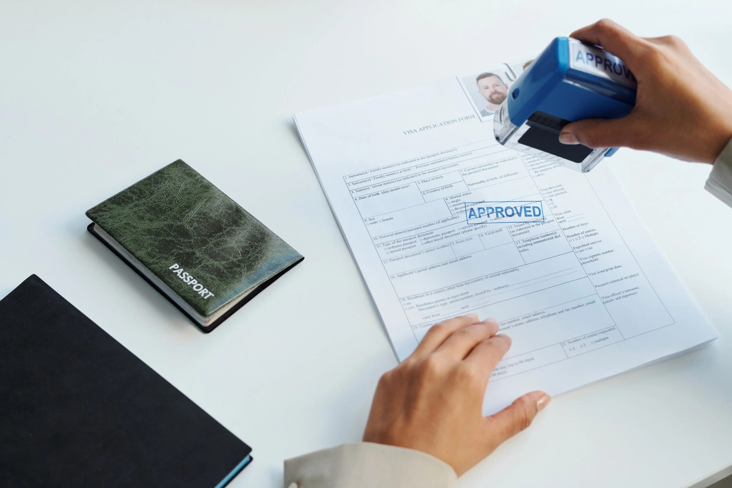 Starting the new job before the visa transfer is officially approved