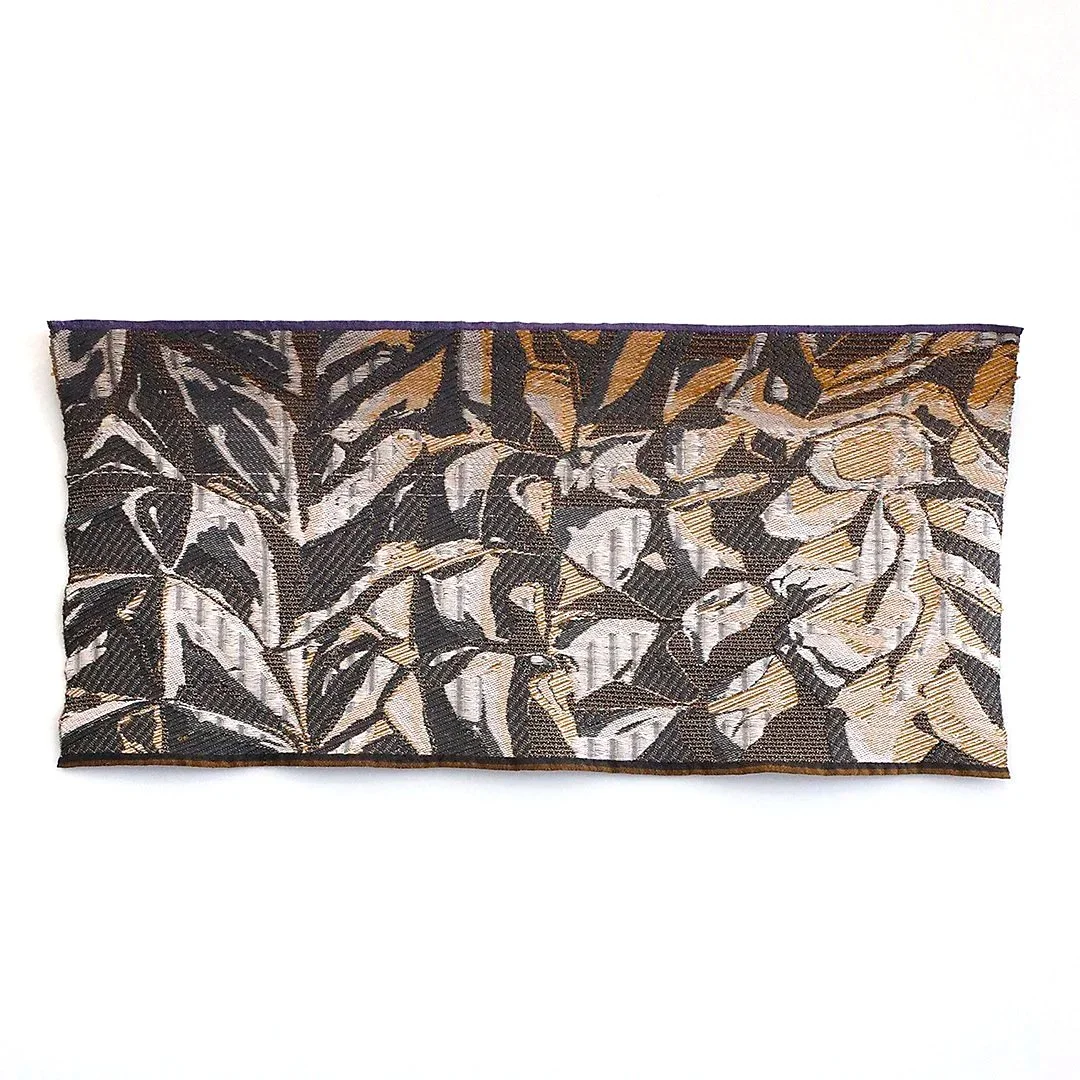 midsize artwork in grey and gold