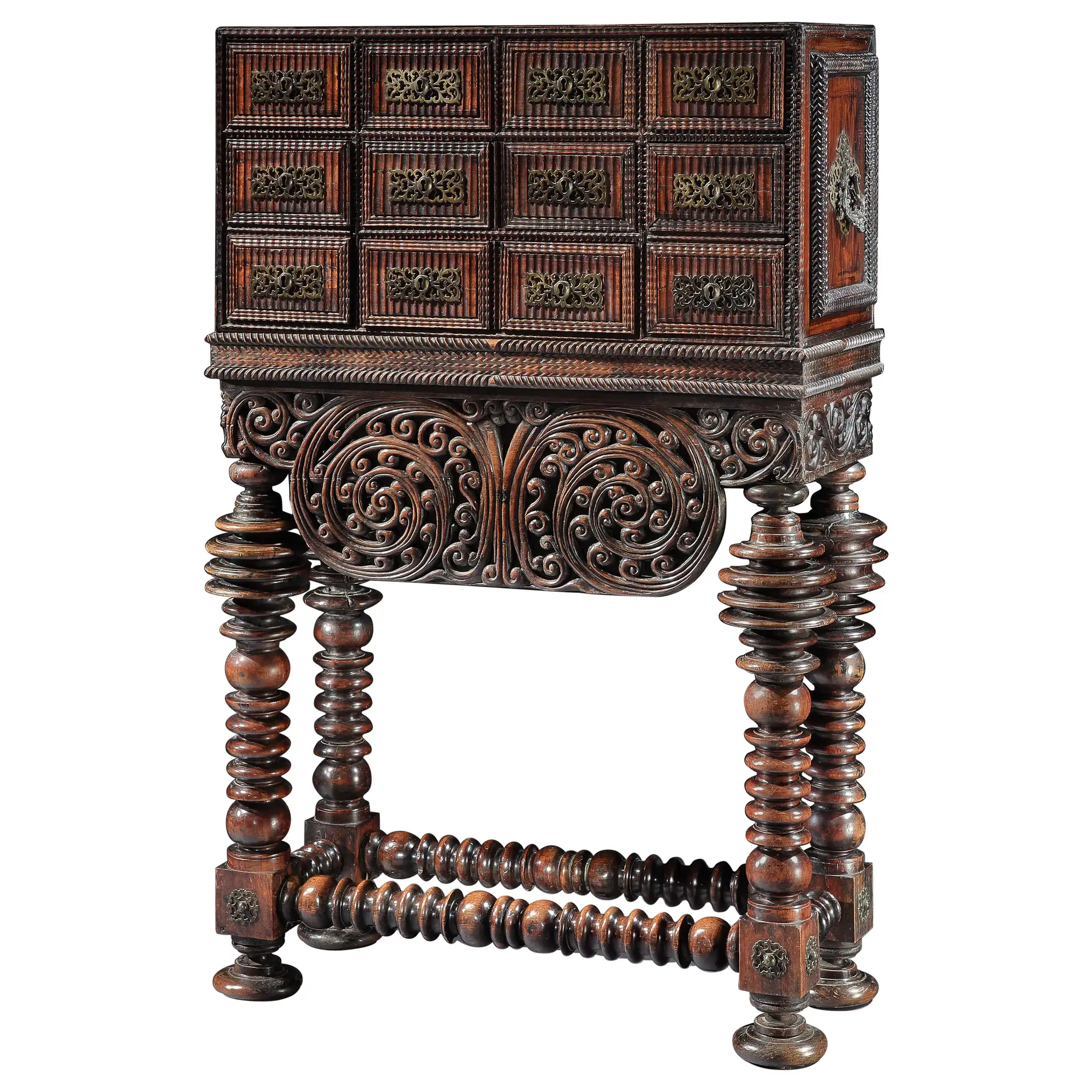 Portuguese Contador Cabinet, through 1stDibs. Rosewood, vinhático, ornate brass fittings, and a richly carved original stand bring warmth, intricate craftsmanship, and architectural presence to a collected interior.