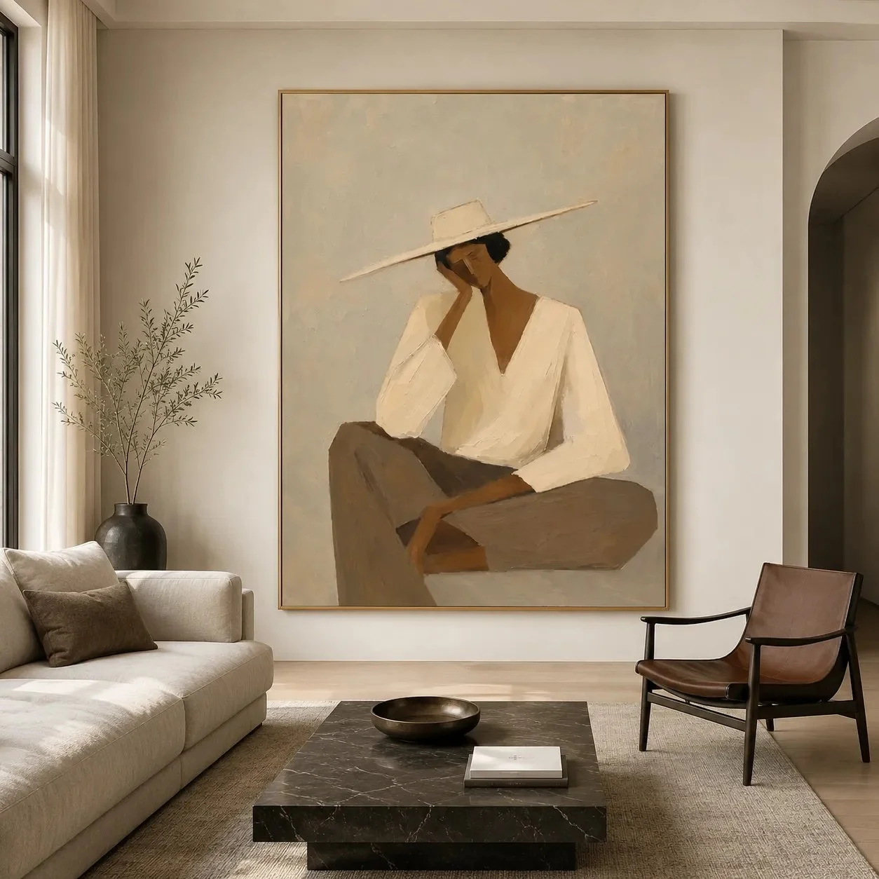 Neutral-toned figurative artwork of a seated woman in a wide-brimmed hat, framed in gold.