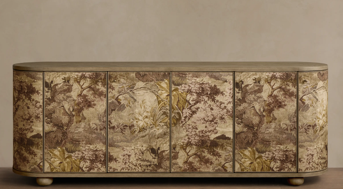 Fresca Six-Door Sideboard | Arhaus

A contemporary silhouette meets Old World romance. Rich botanical detailing, softly rounded edges, and warm wood finishes create a statement piece that feels both collected and timeless.
