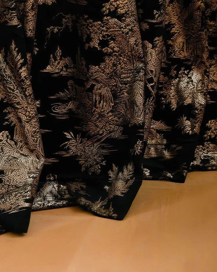 Zen Foil Printed Velvet Curtain by The Hues, featuring a dramatic black velvet ground layered with metallic botanical imagery for a richly textured, atmospheric statement.