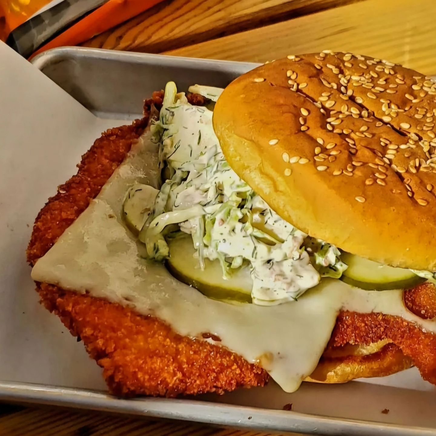 Our pork schnitzel sandwich is always a crowd pleaser. Topped with Swiss cheese, Brussel apple slaw, and our house dill pickles. It's no wonder it's so popular

#sandwich #schnitzel #portland #foodcartsportland #pdxeats