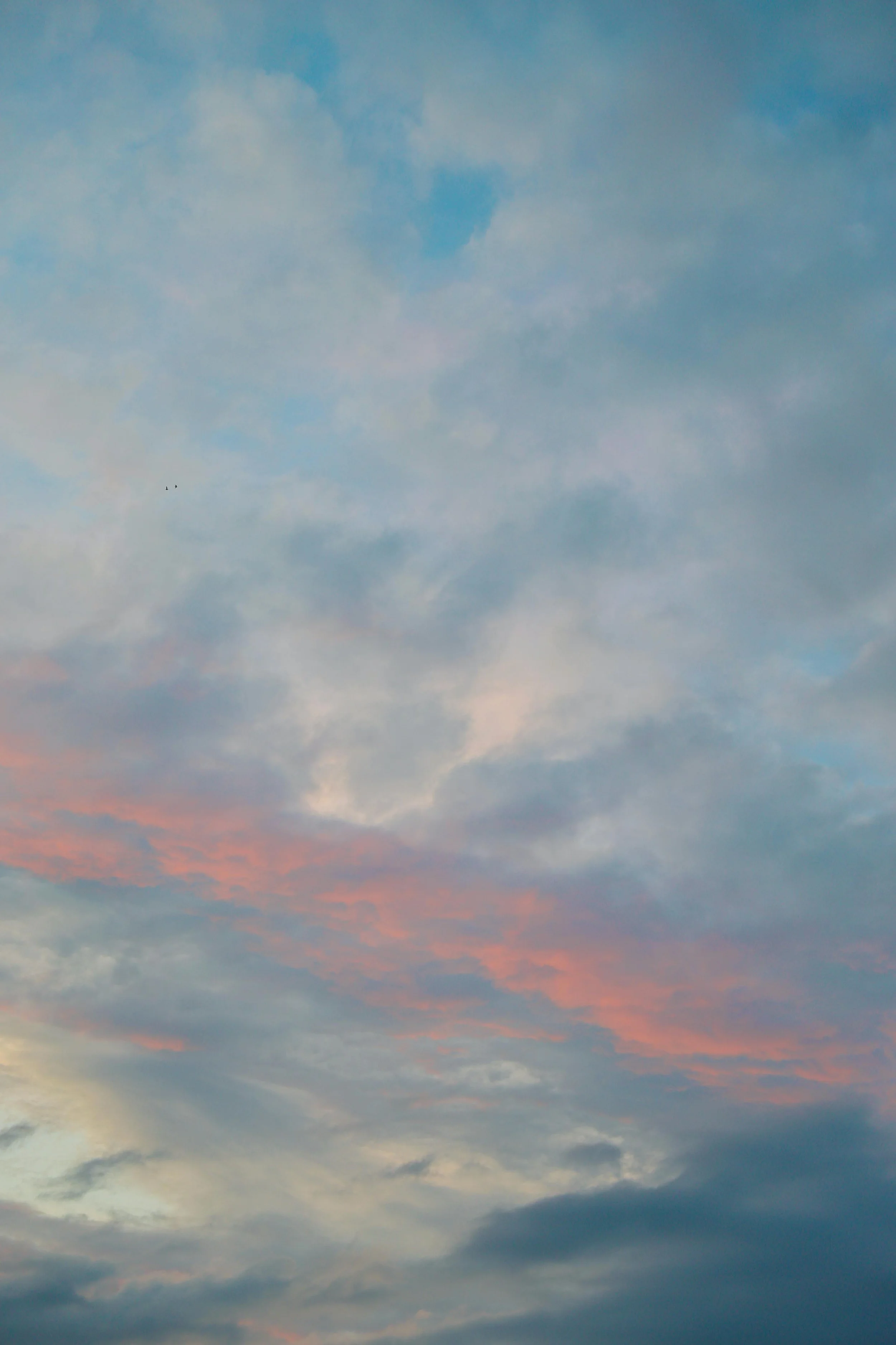 A Reddish and Blue Sky with Clouds