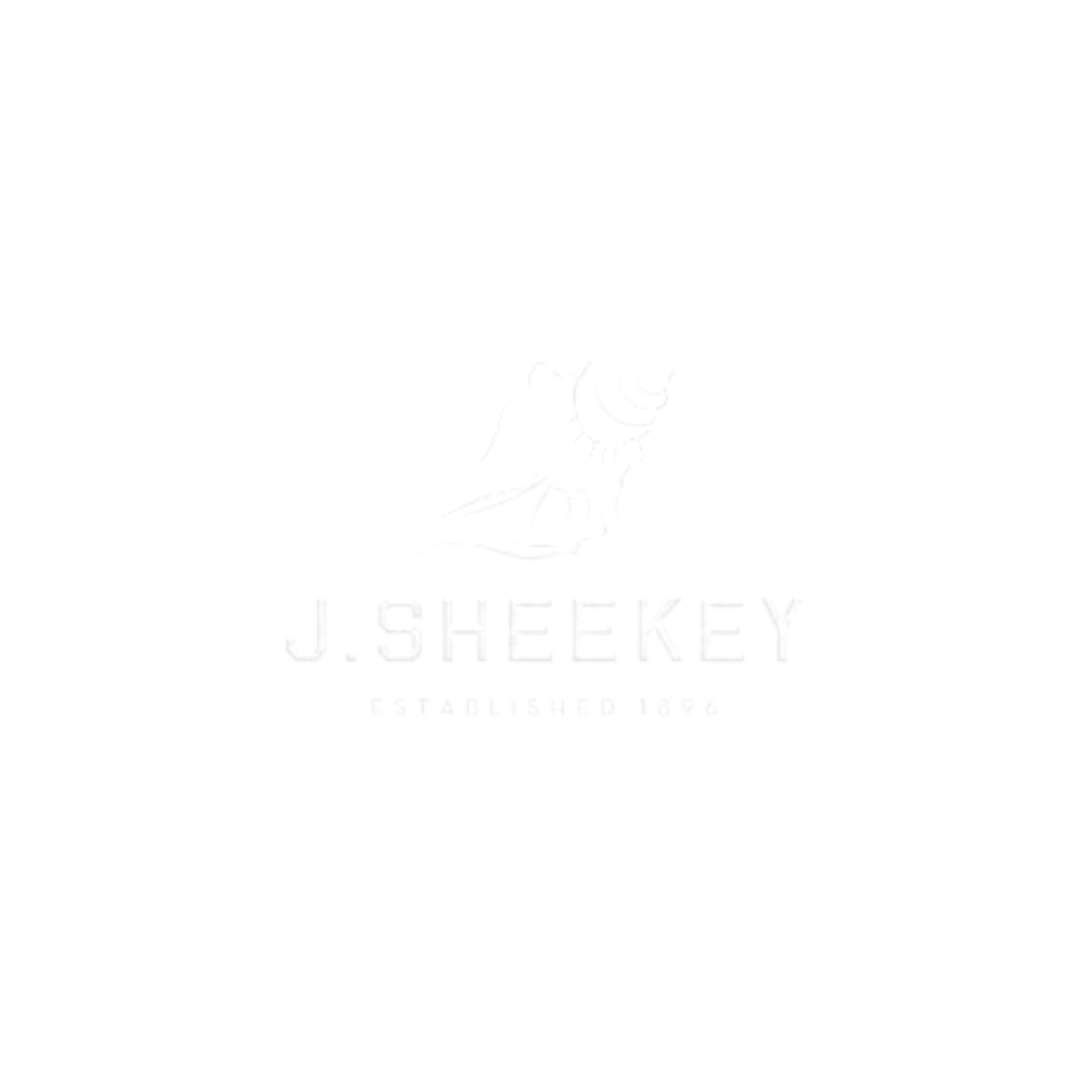 Black and white logo of J. Sheekey seafood restaurant, featuring a fish and the text 'J. Sheekey'.