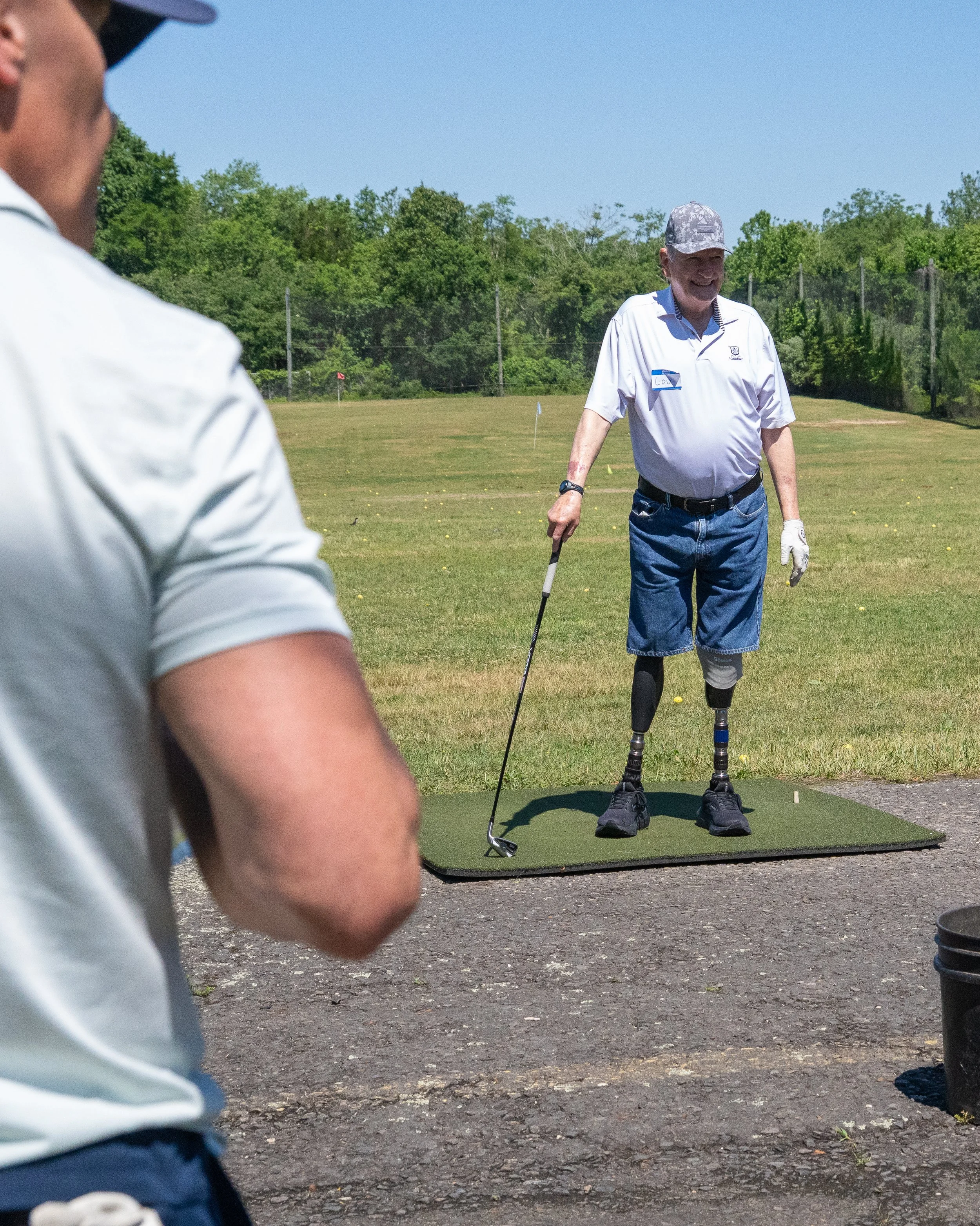  Lou Namm of the Eastern Amputee Golf Association demonstrating adaptive golf technique at the Manfredi O&amp;P clinic in New Jersey 