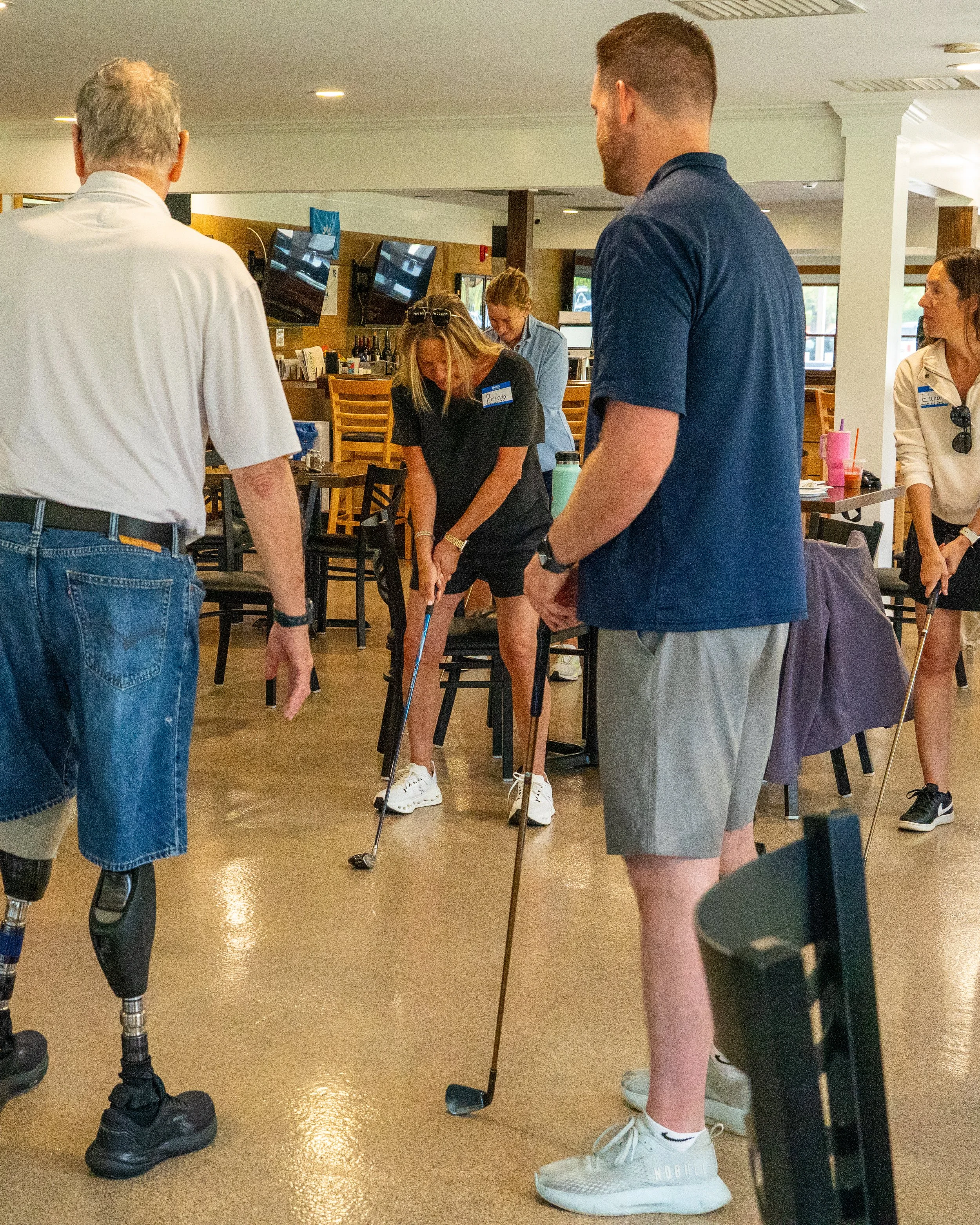  Lou Namm of the Eastern Amputee Golf Association demonstrating adaptive golf technique at the Manfredi O&amp;P clinic in New Jersey 