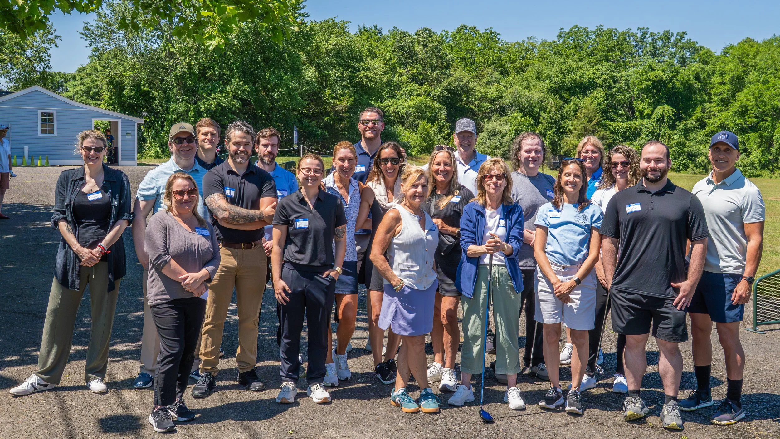 Physical therapists and occupational therapists learning adaptive golf techniques with Lou Namm of the Eastern Amputee Golf Association