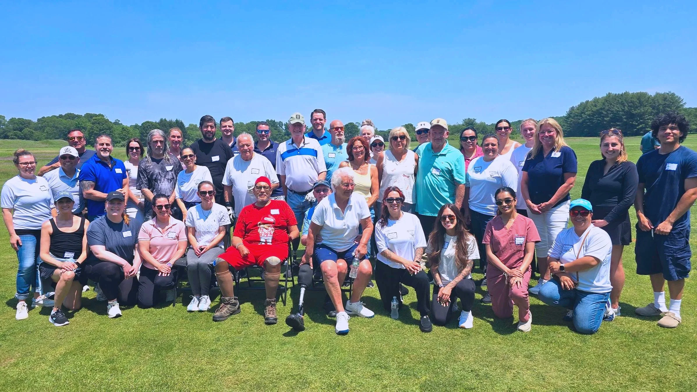 Group of amputees, therapists, and rehab professionals at the 2025 Manfredi O&P First Swing Amputee Golf Clinic in Monmouth County, New Jersey