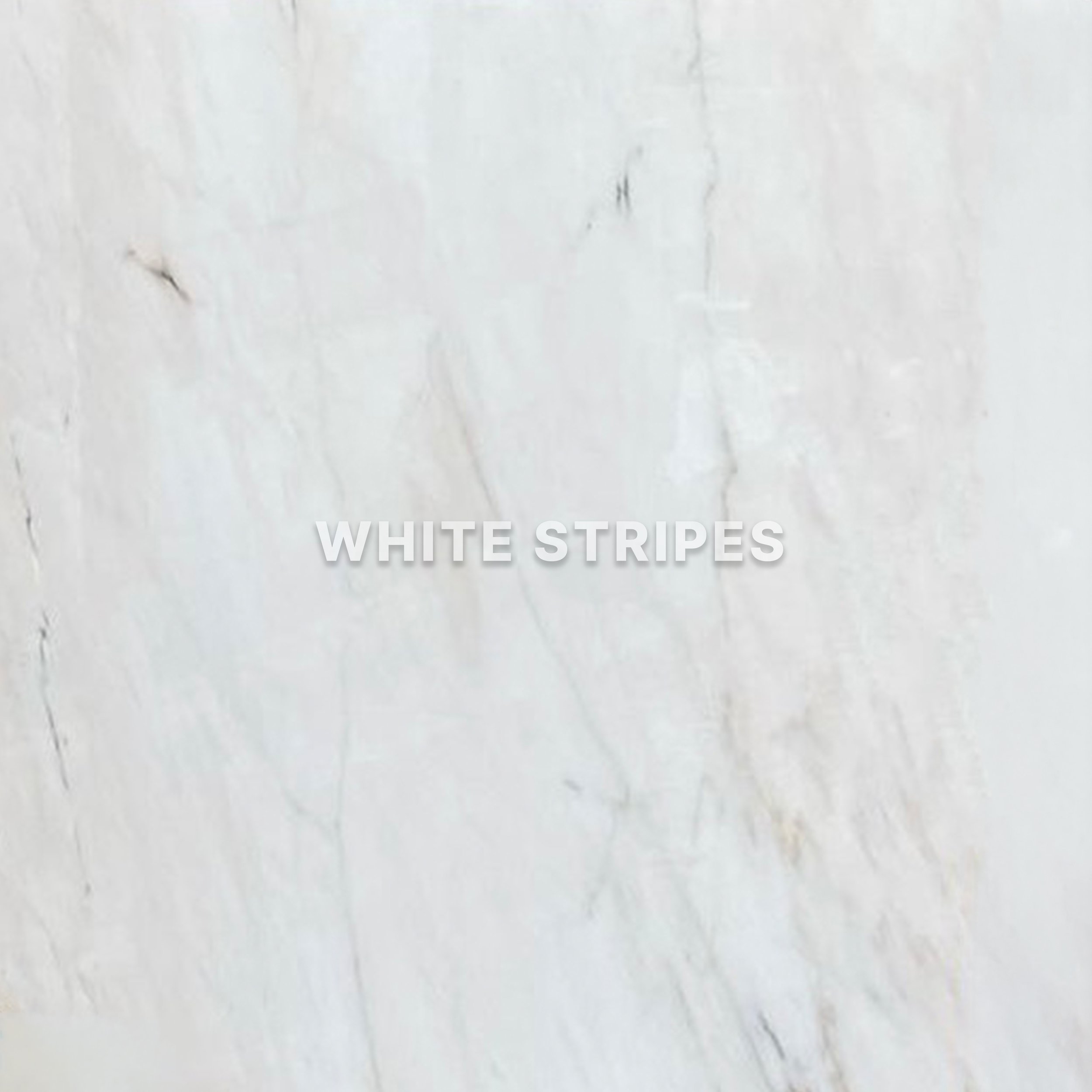 Close-up of a white surface with faint grey and black stripes and some small scratches.